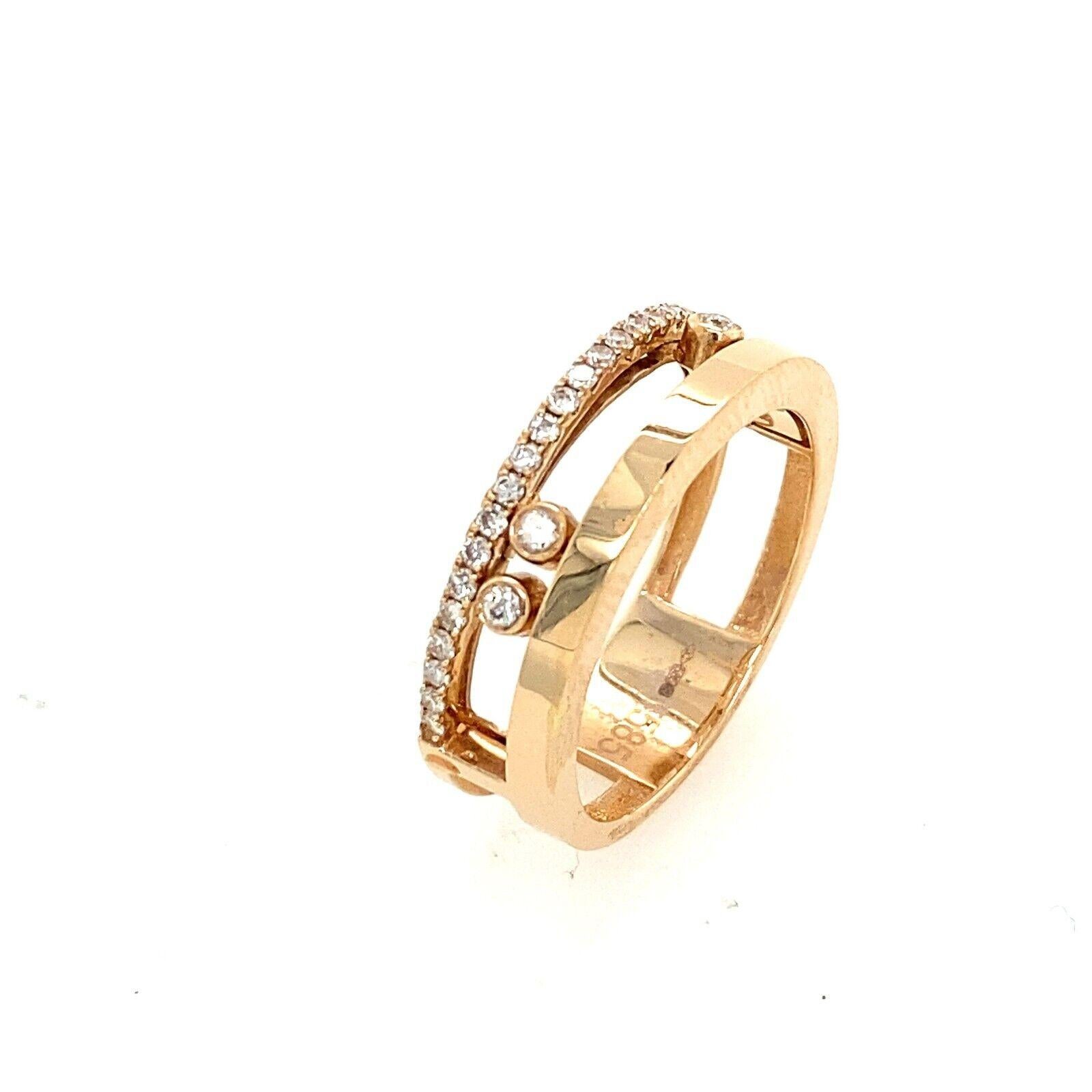 Wide Band with 3 Sliding Diamonds & Row of Pave Set Diamonds in 14ct Rose Gold

This classic 14ct rose gold wide band features three diamonds that slide along the band. Set with a row of pave set diamonds, this ring is perfect for stacking with