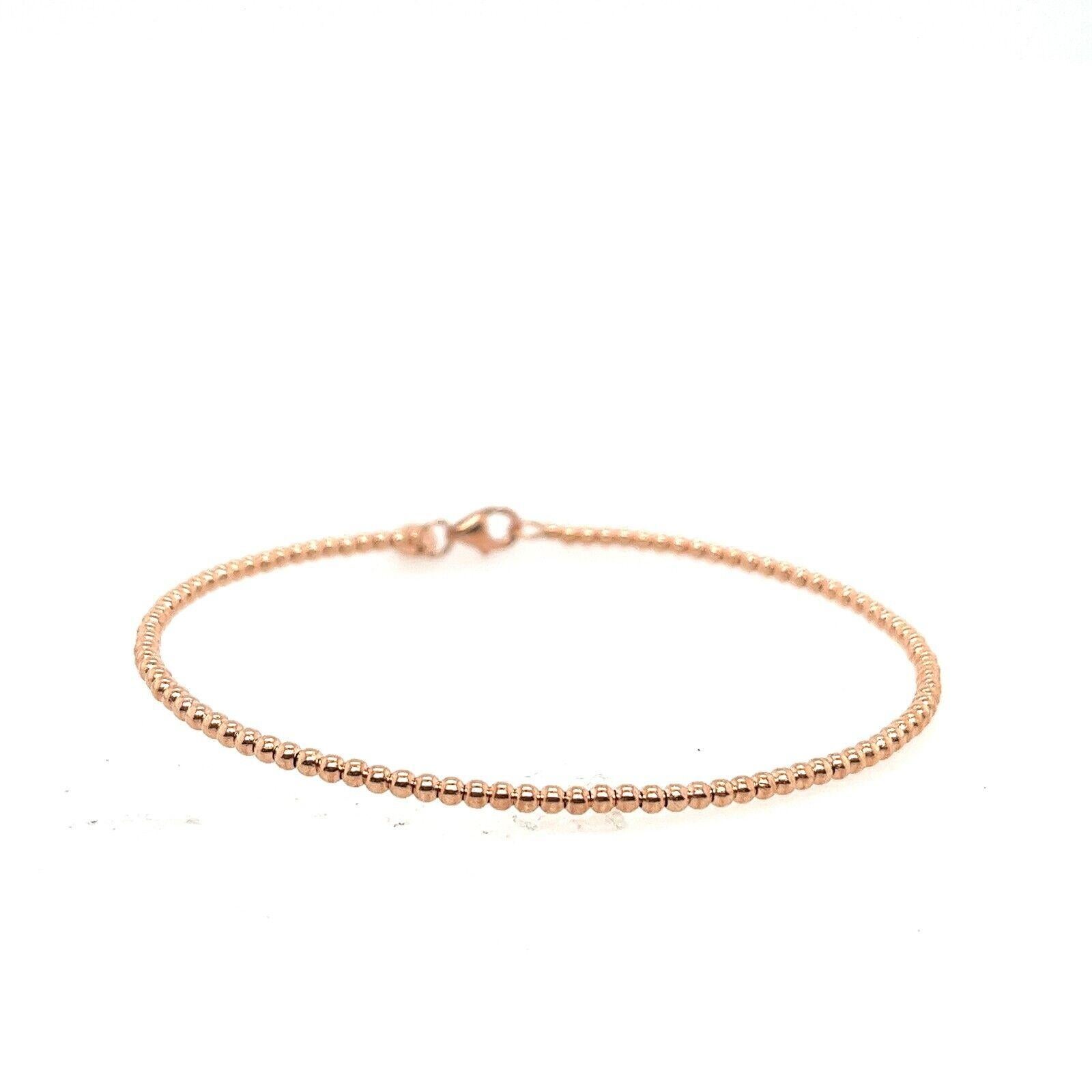 14ct Rose Gold Bead Oval Bangle with a stunningly delicate 2mm width, 
designed to adorn your wrist with elegance and grace.

Additional Information:
Total Weight: 2.5g
Closure: Lobster
Item Dimensions:6.2mm x 5mm
SMS8616