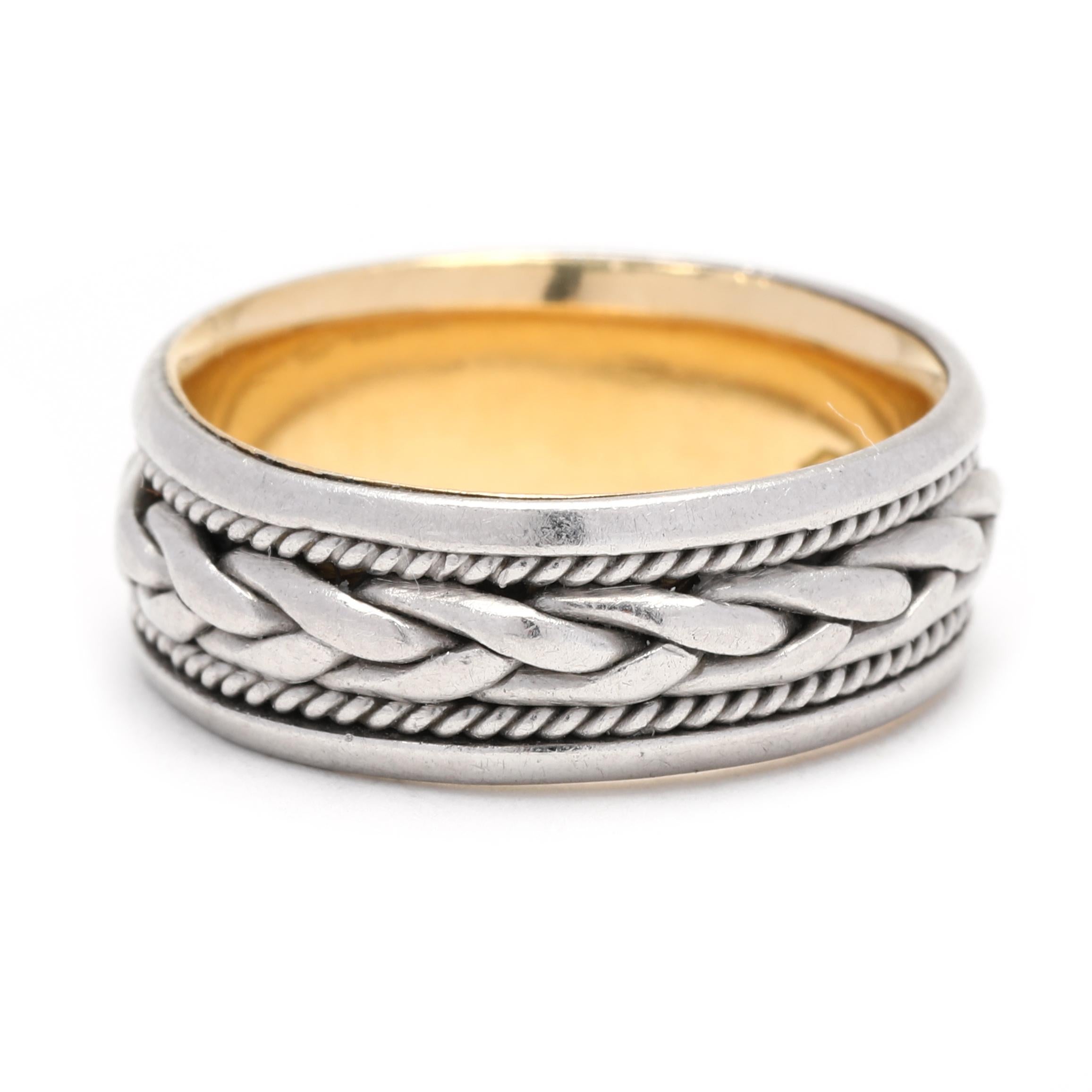 This one-of-a-kind Wide Braided Eternity Wedding Band is a stunning symbol of your eternal love. Crafted from 18K yellow gold and platinum, this beautiful ring features an intricate braid pattern that wraps all the way around the band. With a width
