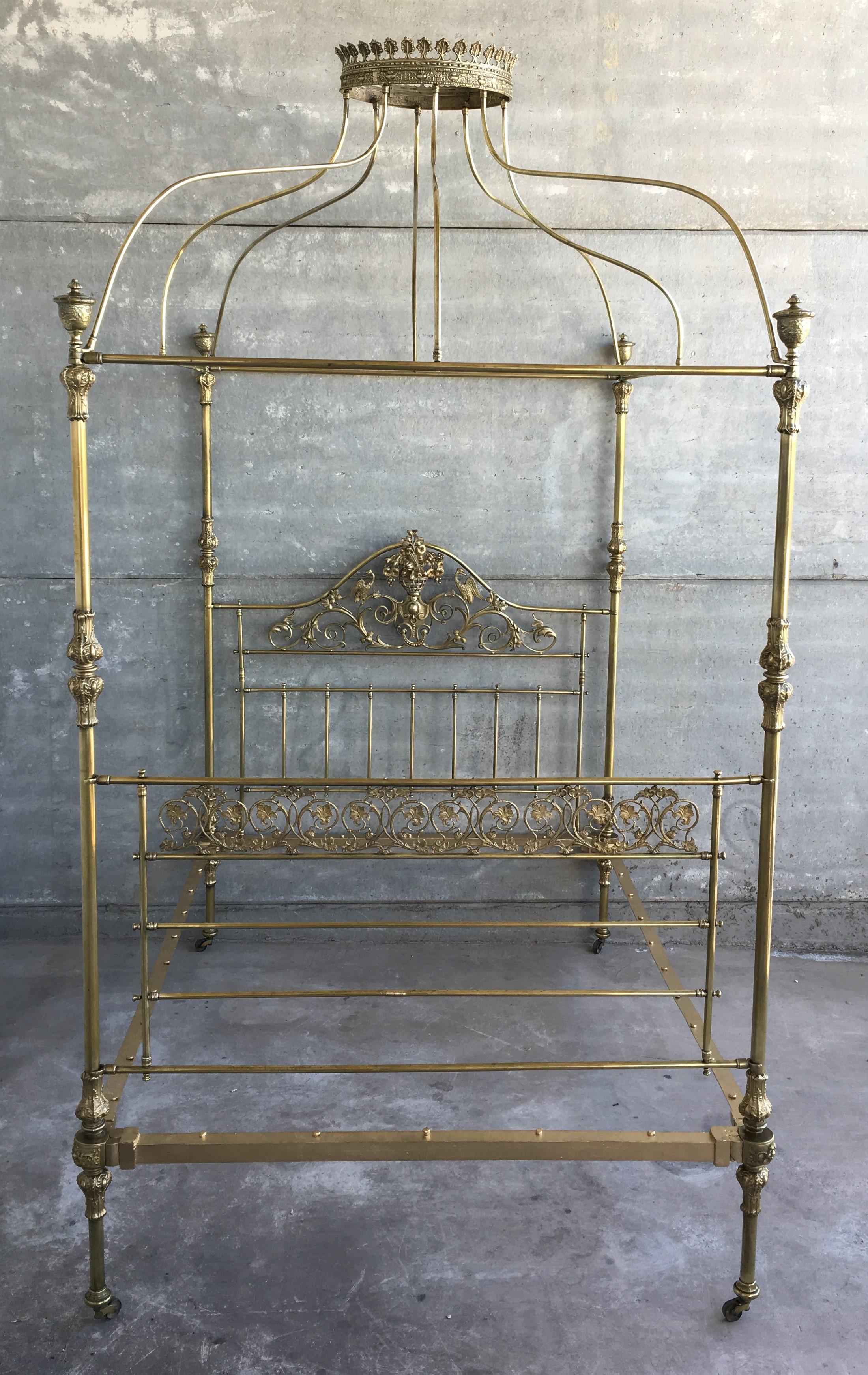 19th century wide brass four poster bed with bird castings, ornamental motifs and crown
A magnificent all brass four poster bed with etched posts, ornate brass fittings, decorative brass knee-caps, delicate castings depicting birds and serpentine