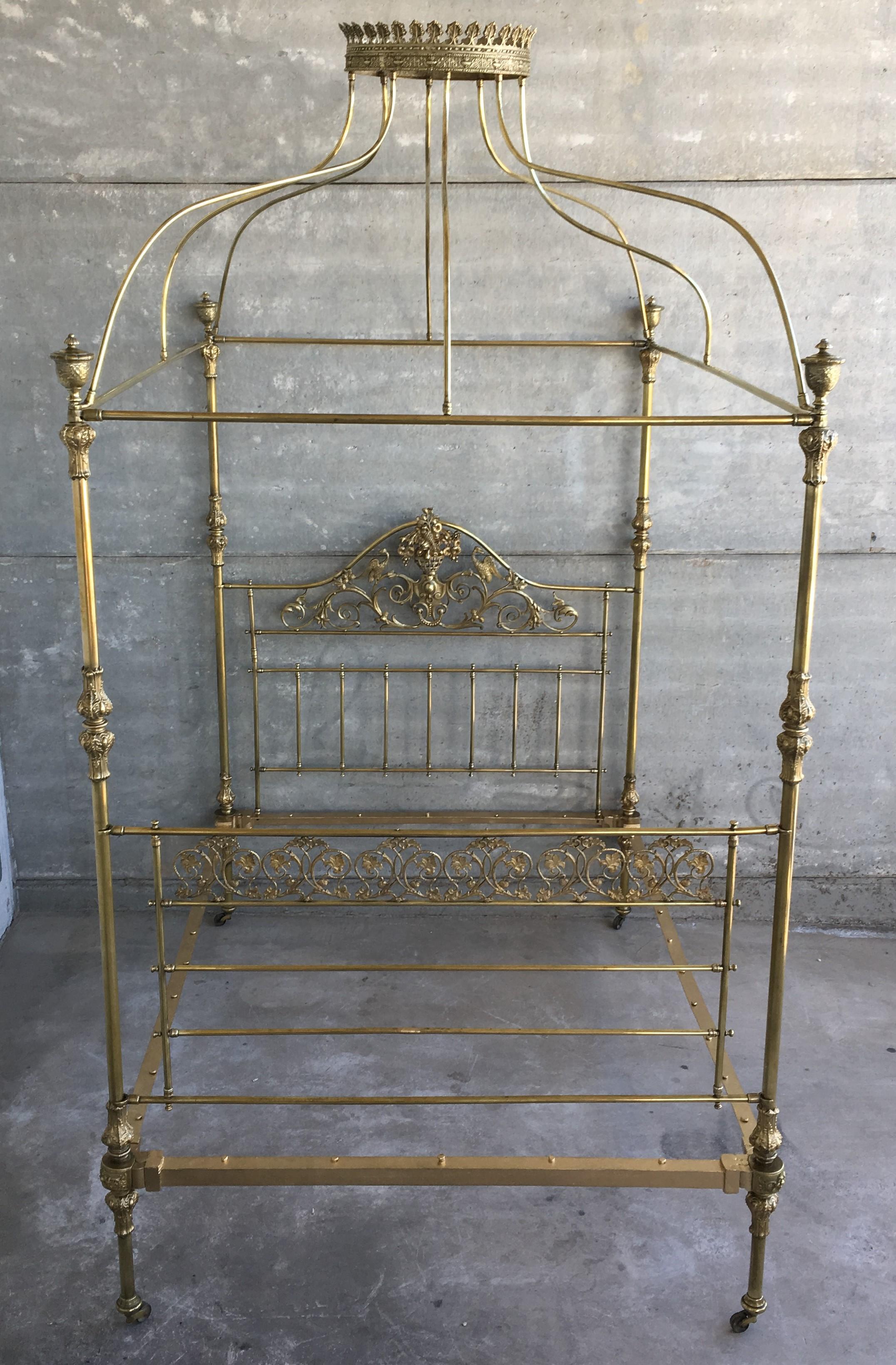 Wide Brass Four Poster Bed with Bird Castings, Ornamental Motifs and Crown In Good Condition In Miami, FL