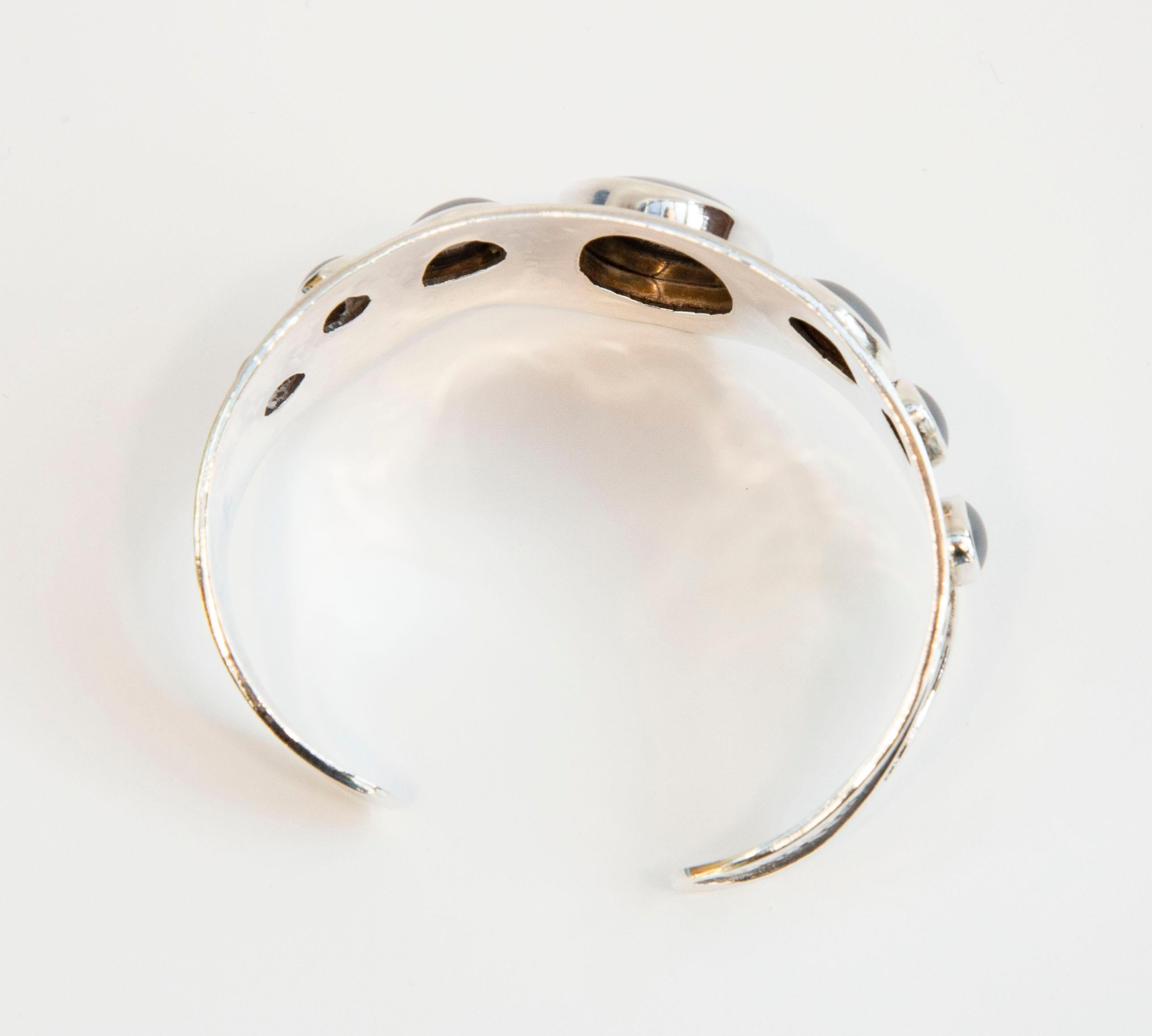 Oval Cut Wide Contoured Sterling Silver Hammered Cuff  Bracelet with Oval Hematite Caboch For Sale
