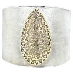 Wide Cuff Featuring 14 Karat Yellow Gold Accents