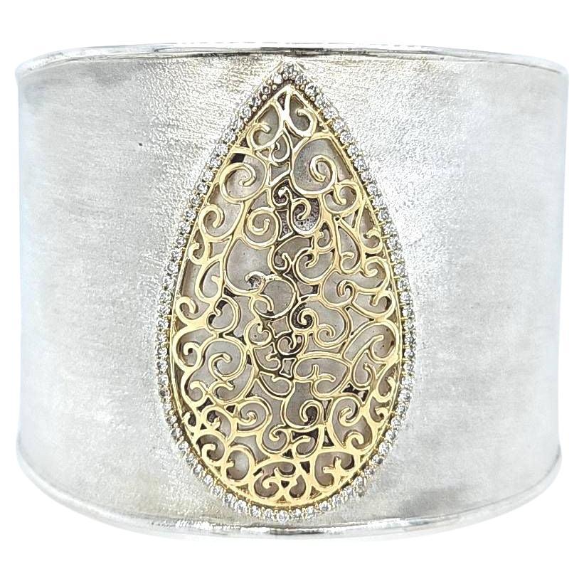 Wide Diamond Accented Cuff Featuring 14 Karat Yellow Gold