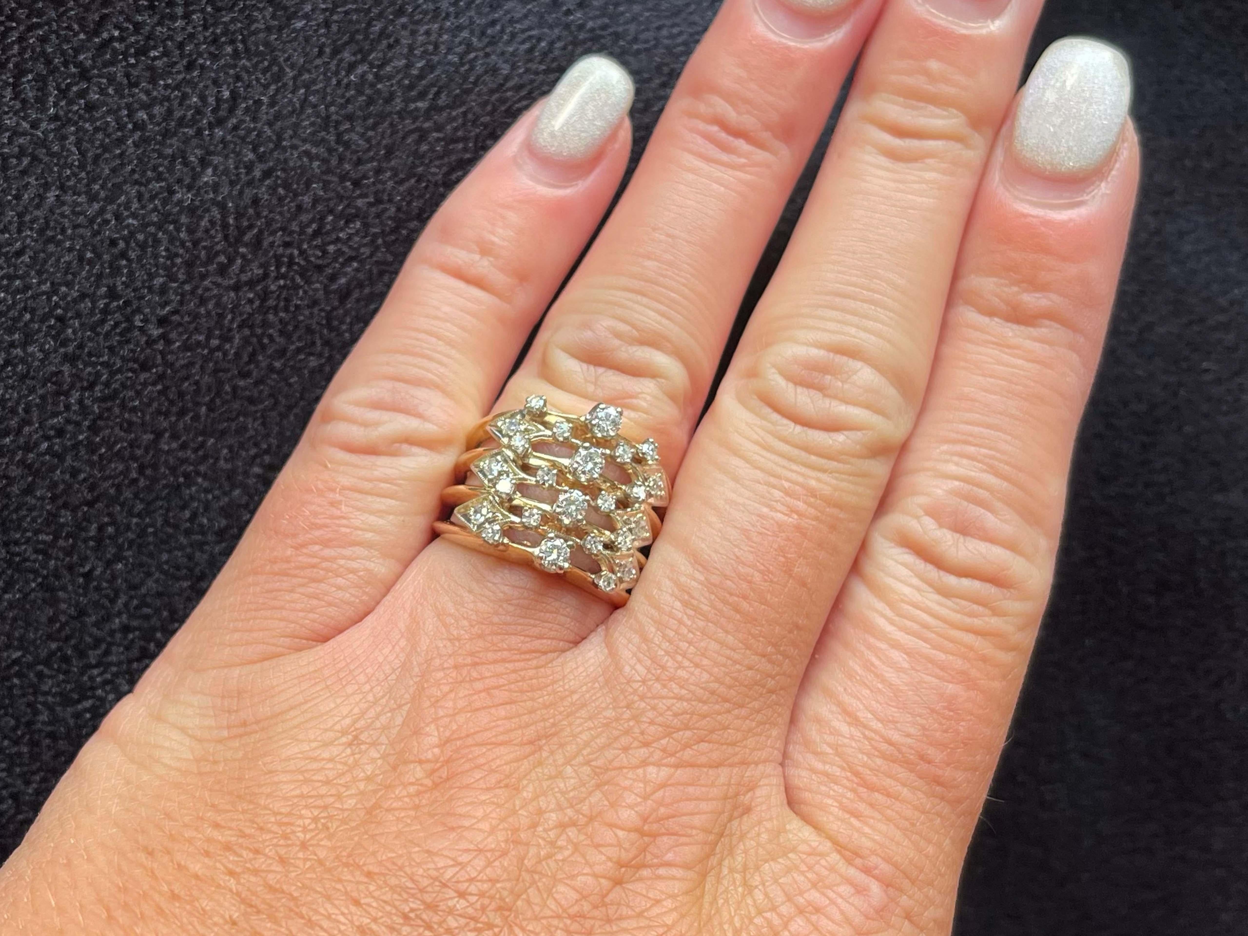 Item Specifications:

Metal: 14K Yellow Gold

Style: Statement Ring

Ring Size: 6 (resizing available for a fee)

Total Weight: 10 Grams
​
​Diamond Count: 24

Diamond Cut: brilliant and single cut

Diamond Carat Weight: 0.45

Diamond Color: