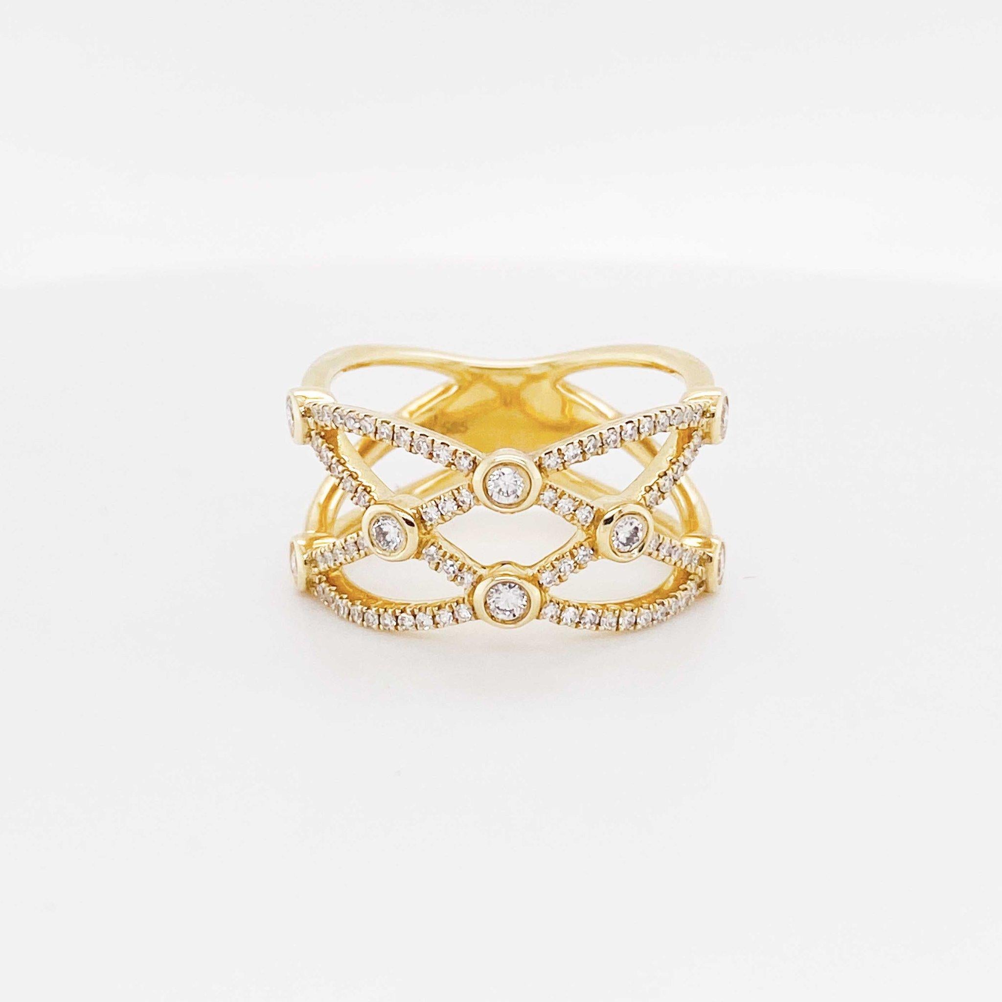 Dieses geflochtene Diamantband ist aufregend und trendy!  Mit über 75 Diamanten besetzt, funkelt und glänzt dieses Band wirklich!  Das helle 14-karätige Gelbgold und die wunderschön geschliffenen Diamanten sorgen für eine tolle Präsentation und