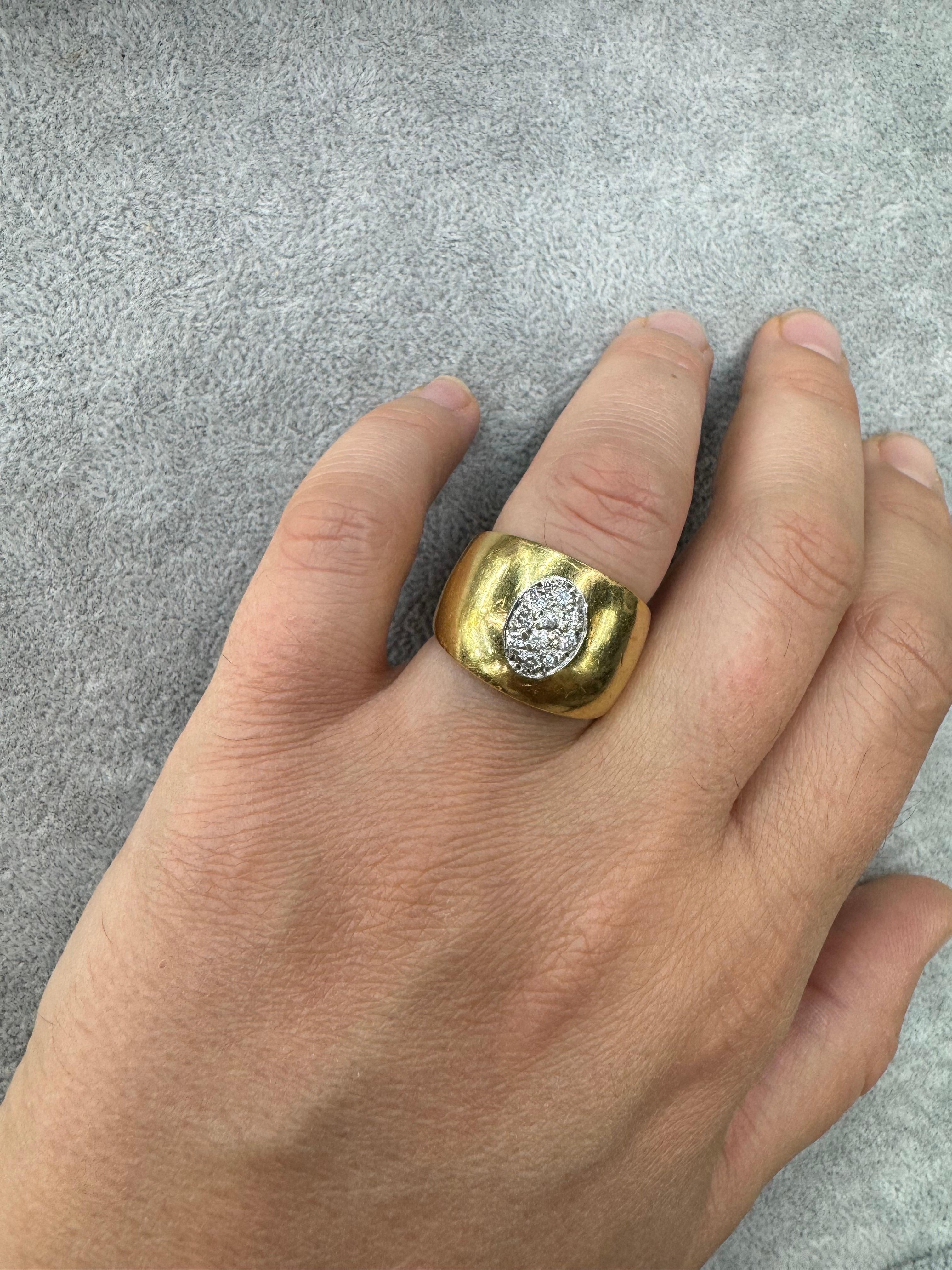 18 Karat yellow gold band featuring 10 round brilliants weighing 0.40 carats.
Front 15.1 MM 
Back 6.7 MM

Very comfortable on the hand. 
More Band Rings in Stock
Message for Pictures & Information
