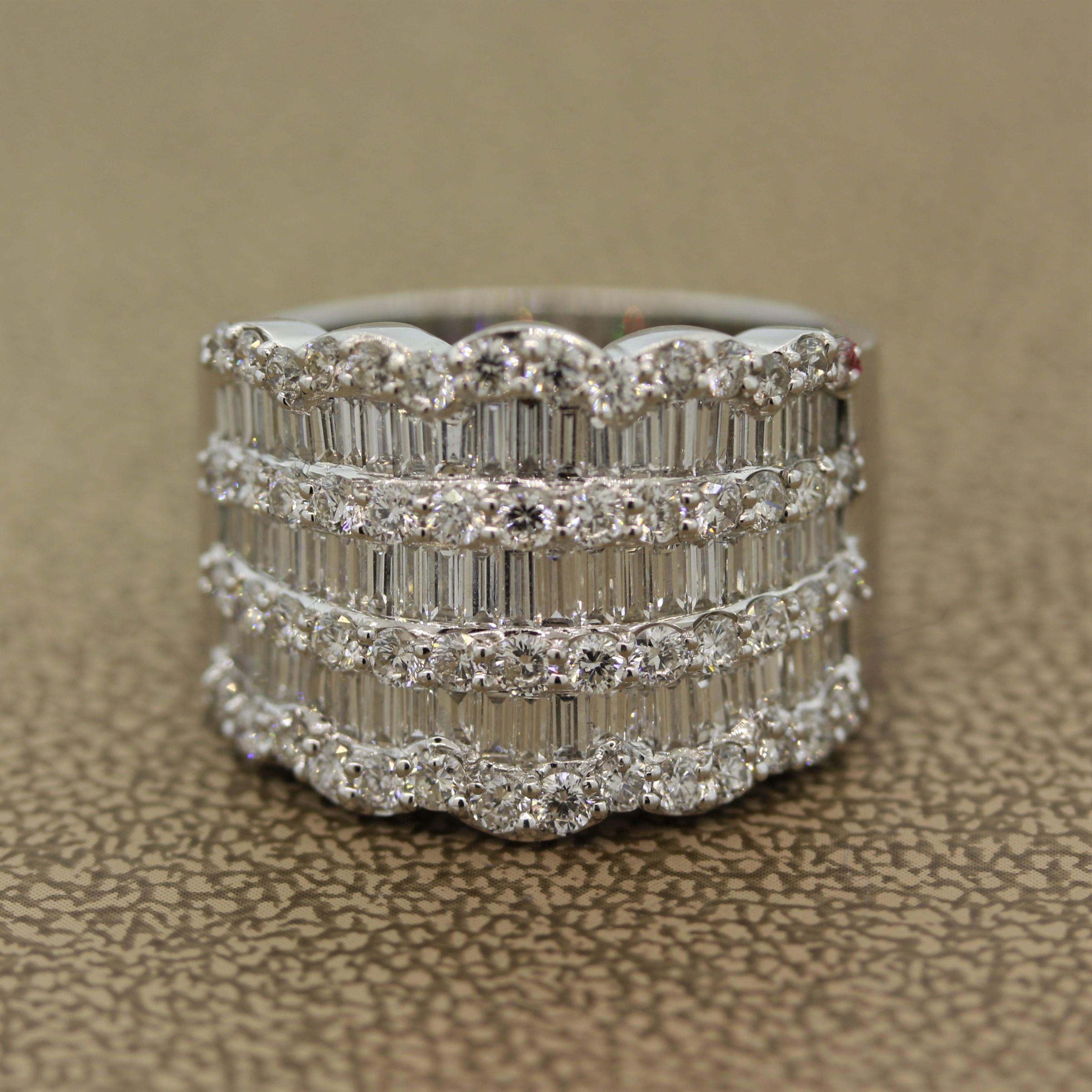 A classic wide diamond band ring featuring round brilliant cut diamonds along with baguette cut diamonds which are channel set in between the rounds. The total diamond weight is 2.71 carats and they are VS in clarity and have a color of F-G.

Ring