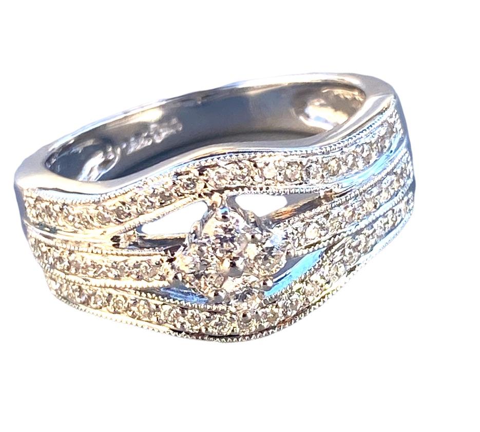 Women's 18Kt White Gold Diamond Band Ring .55 Carats For Sale
