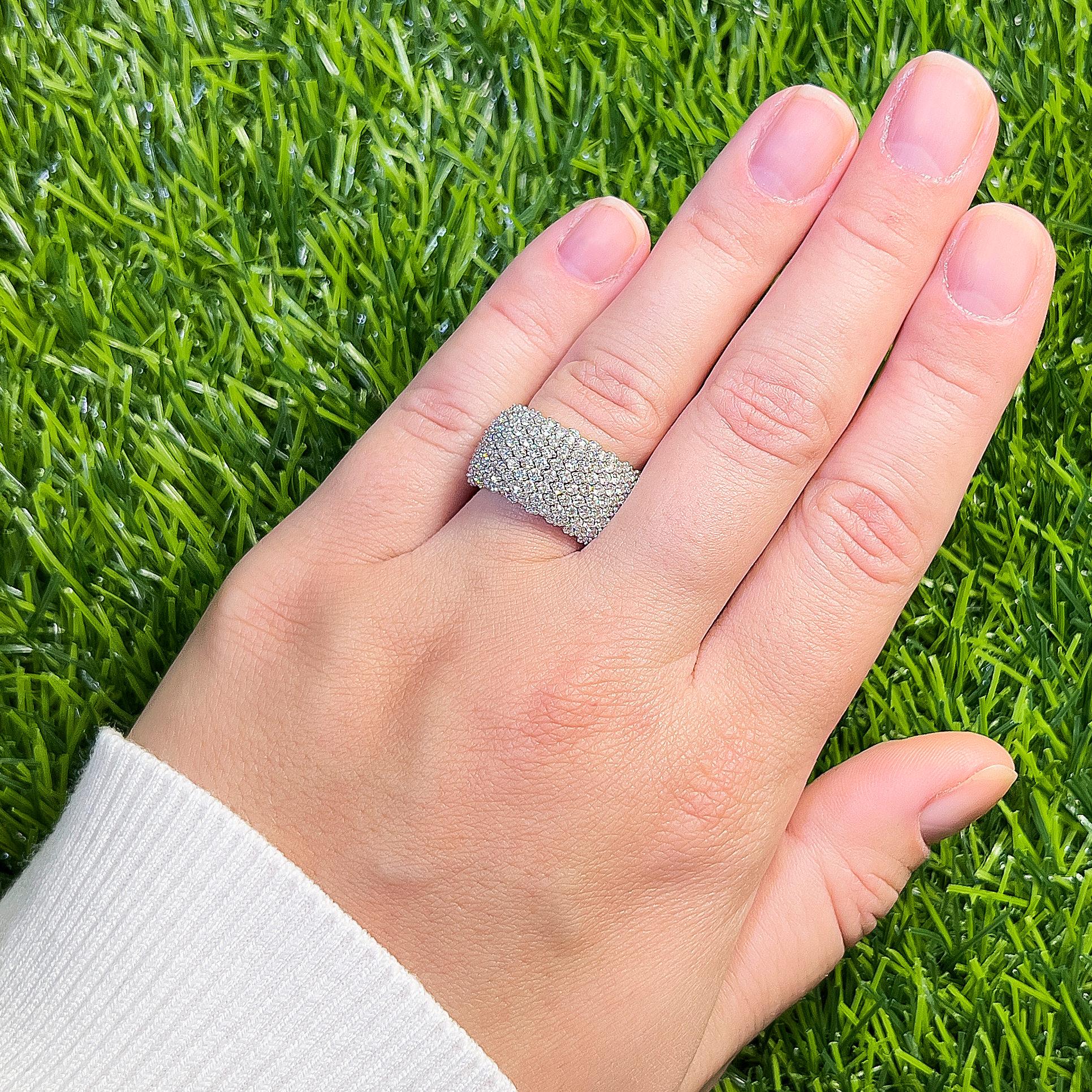 It comes with the appraisal by GIA GG/AJP
Diamonds = 1.98 Carats
Total Quantity: 158
Origin: Natural, Cut: Round
Metal: 18K White Gold
Ring Size: 8* US
*Ring has stretch to it