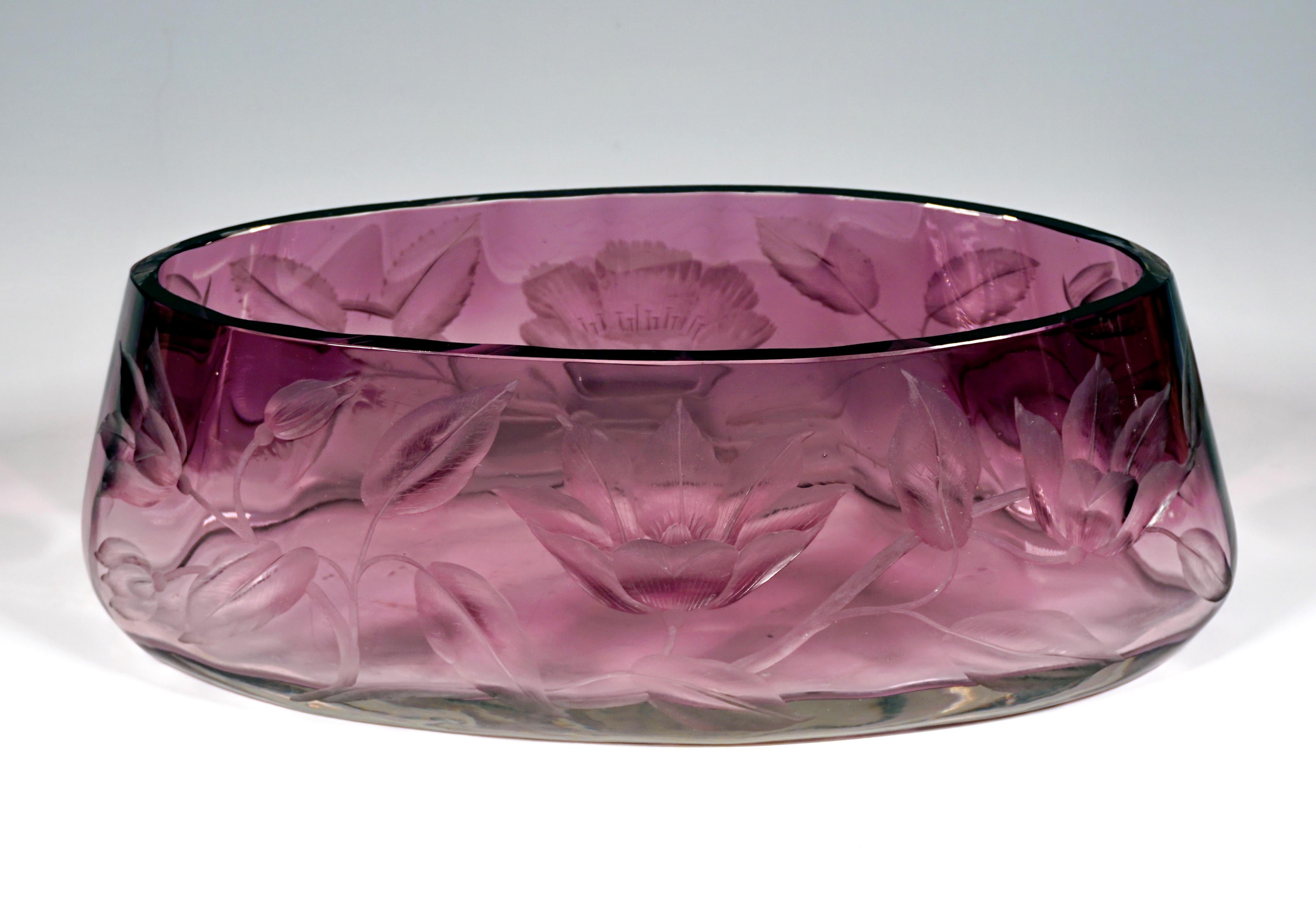 Flat, wide vase with an oval basic shape, walls slightly narrowing towards the top, colorless glass thickened in a wave-shaped manner on the inside, tapering purple towards the top, with surrounding, deeply cut rose, flower and leaf tendril