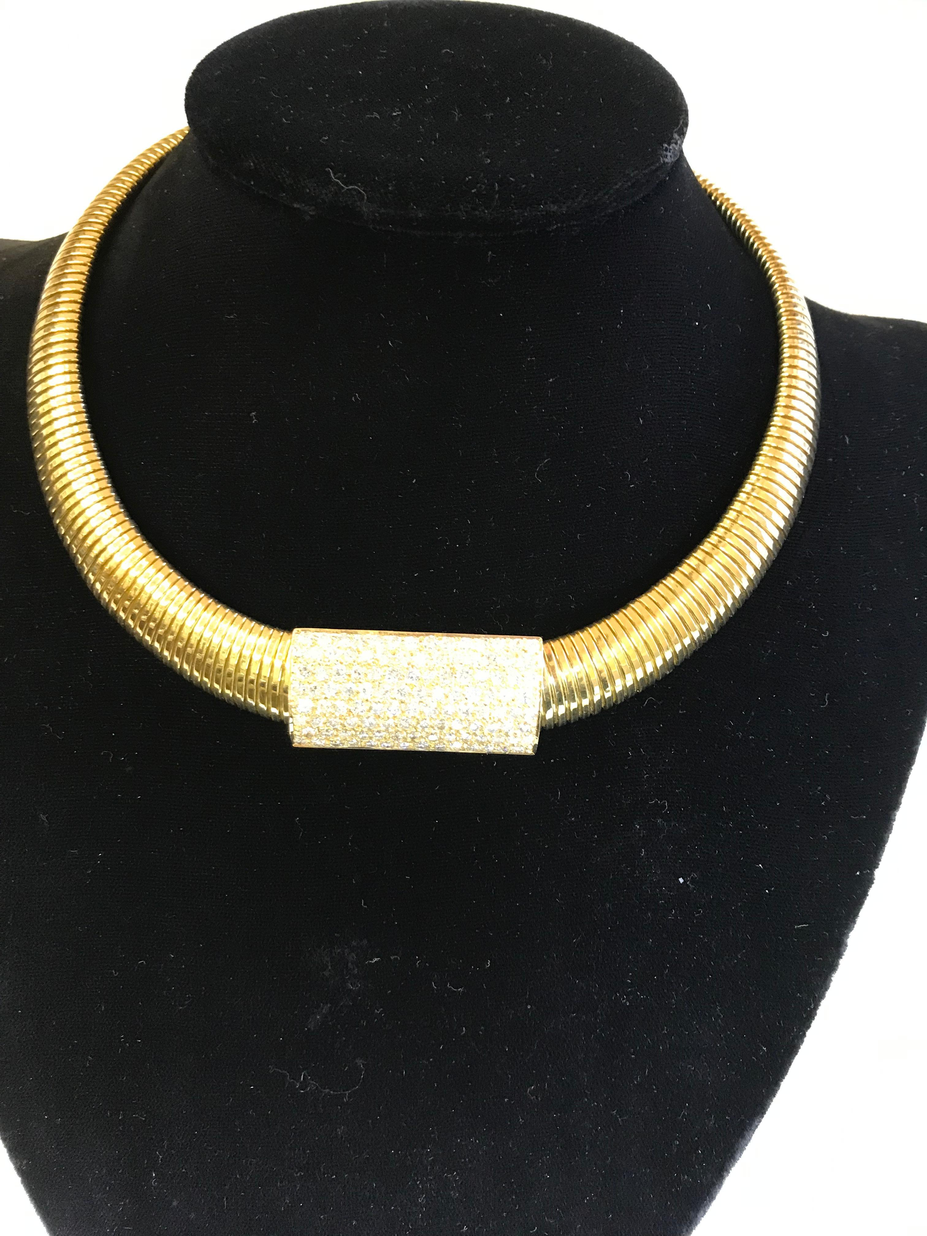 This gorgeous piece is sure to get you noticed! Dress it up or wear it casual, the diamond pendant is removable giving you two looks!
18K yellow gold Gooseneck Necklace 
Approximately 3/4 inches wide, graduating to approximately 6/8 inch wide
Rests