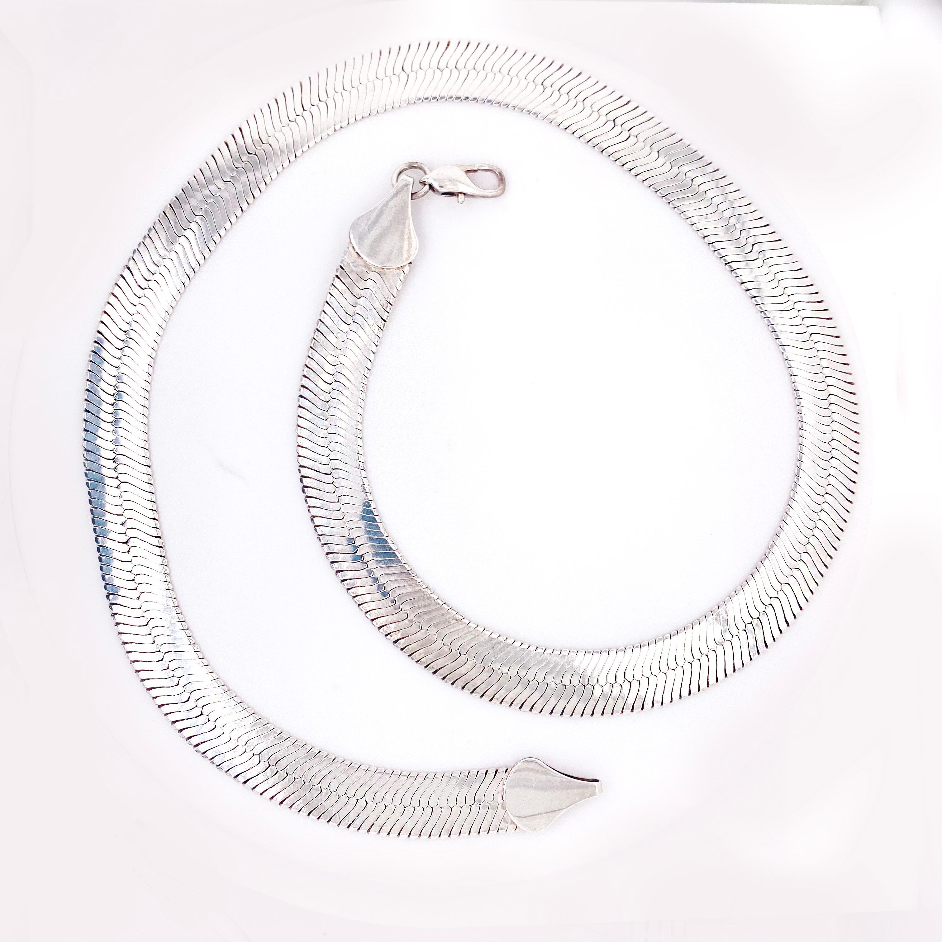 Unisex extra large herringbone chain in sterling. 
Eleven millimeters across with a super shiny finish! Look super bold and cool in this wide chain that has a mirror finish and extra heavy at 44 grams. The chain is 20 inch which looks great on a man