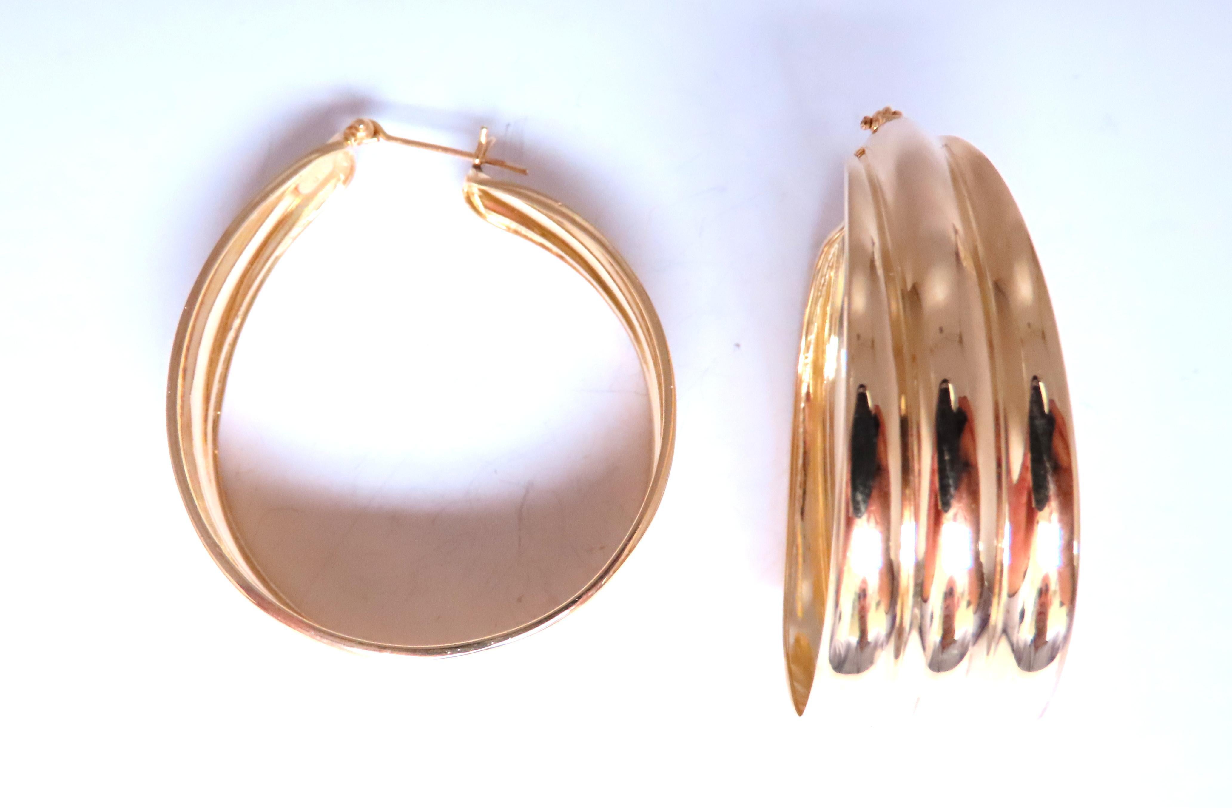 comfortable lever clip 
high shine hoop earrings 
37 x 45 x 15mm 
14kt yellow gold 11.7 grams