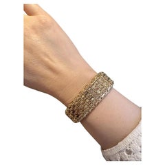 Breites italienisches Goldwellenarmband aus 18 Karat Gelbgold