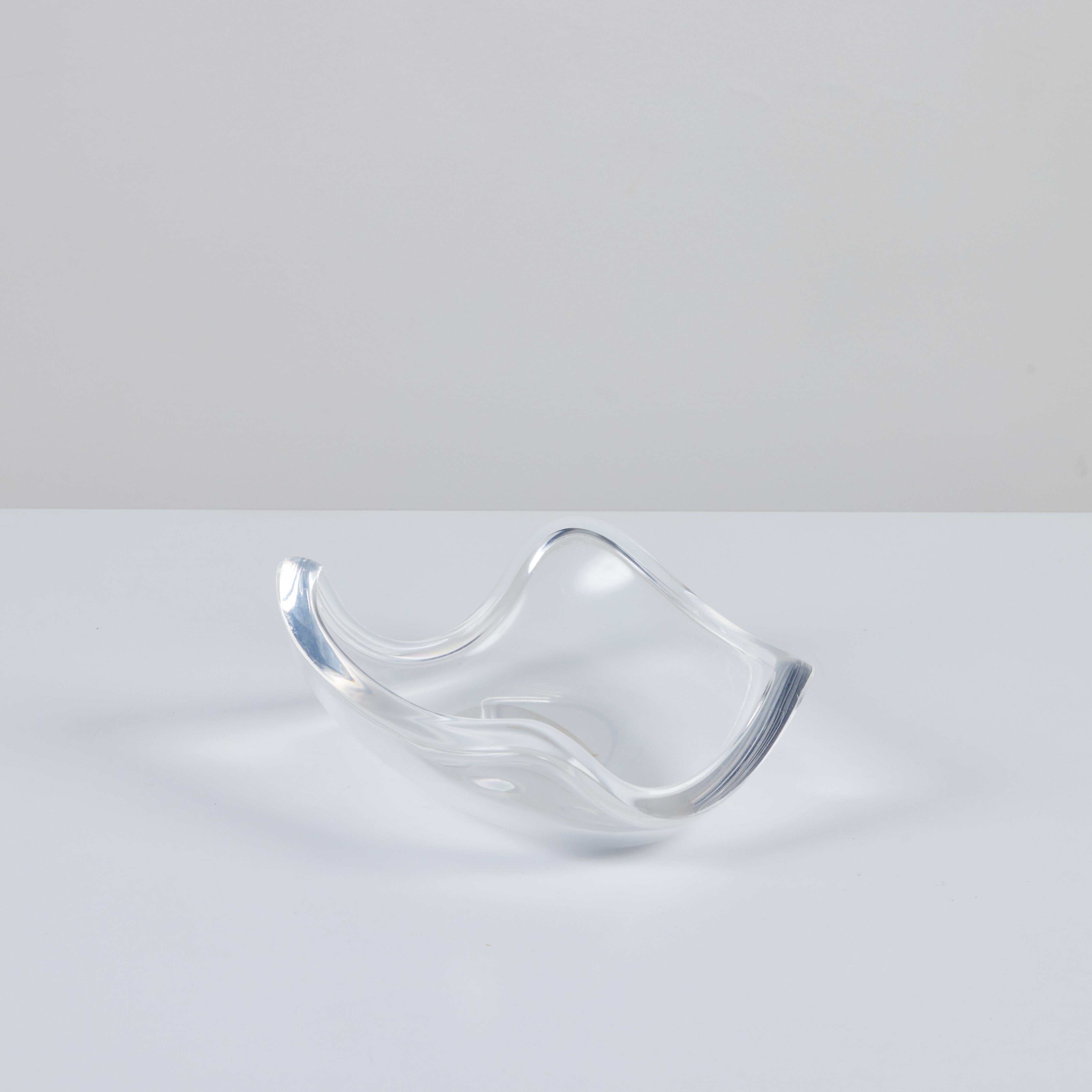 Lucite bowl by Ritts Co., c.1970s, USA. The bowl features curled sides with soft rounded curves. This piece can serve as a vide poche, catchall, or fruit bowl.

Dimensions
12