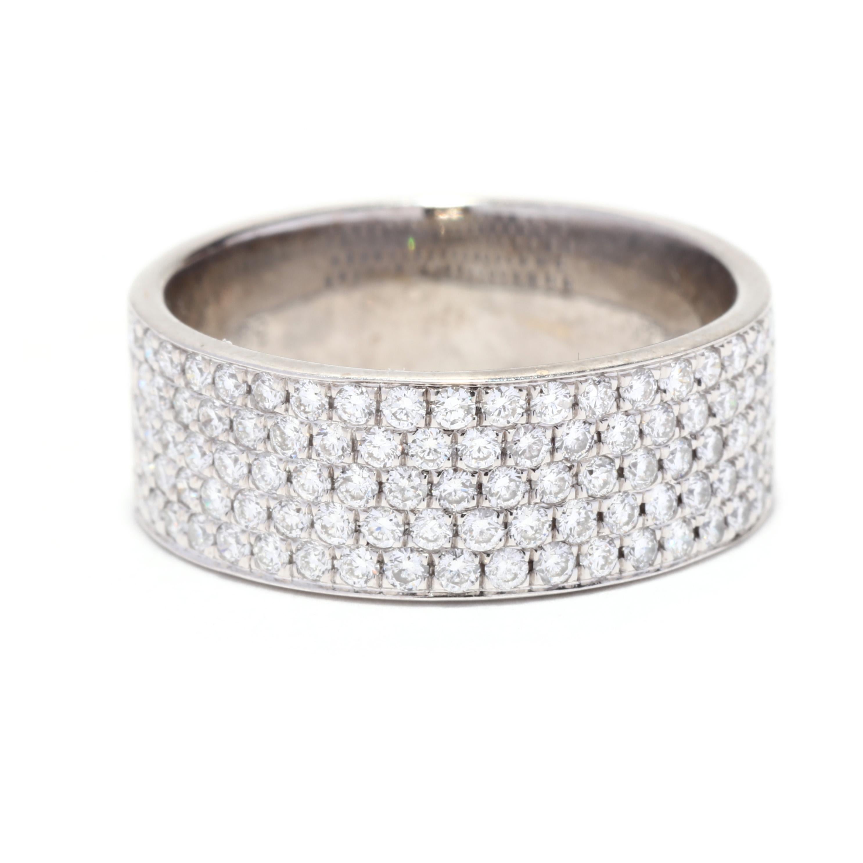 A 14 karat white gold wide pavé diamond band. This wide wedding band features a flat wide band design with pavé set, round brilliant cut diamonds weighing approximately 1.10 total carats and with a straight band.

Stones:
- diamonds, 93 stones
-