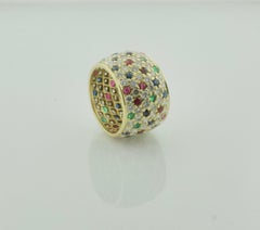 Wide Pave' Eternity Band with Diamonds, Sapphires and Rubies in 18k Yellow Gold