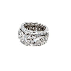 Wide Platinum Eternity Band Featuring Round, Marquise, & Square Emerald Diamonds