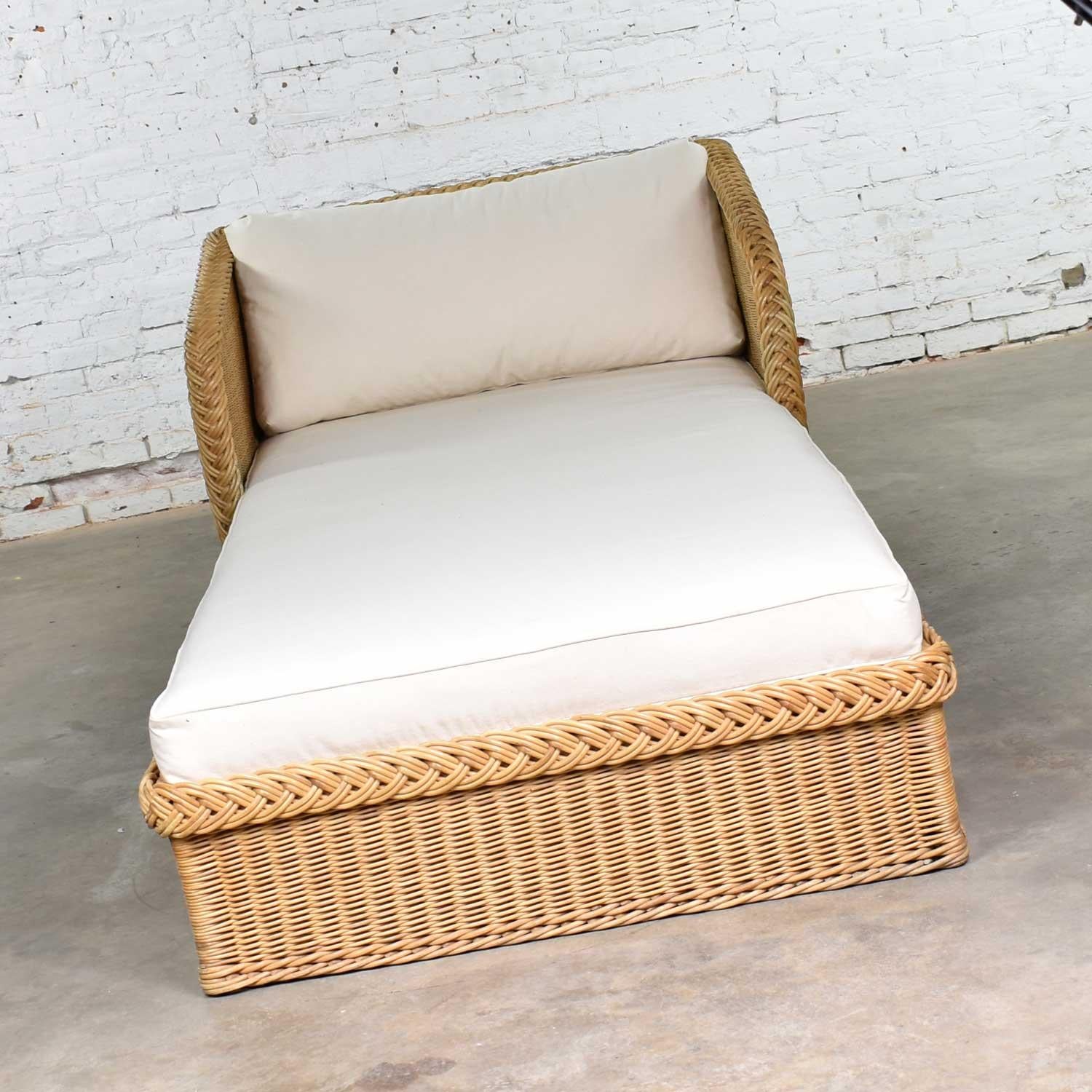 Handsome extra wide wicker chaise W7800 by Bielecky Brothers, Inc. It is in fabulous vintage condition. We have had it recovered in a wonderful white canvas. Please see photos. Circa late 20th century to early 21st century.

Note: There is a