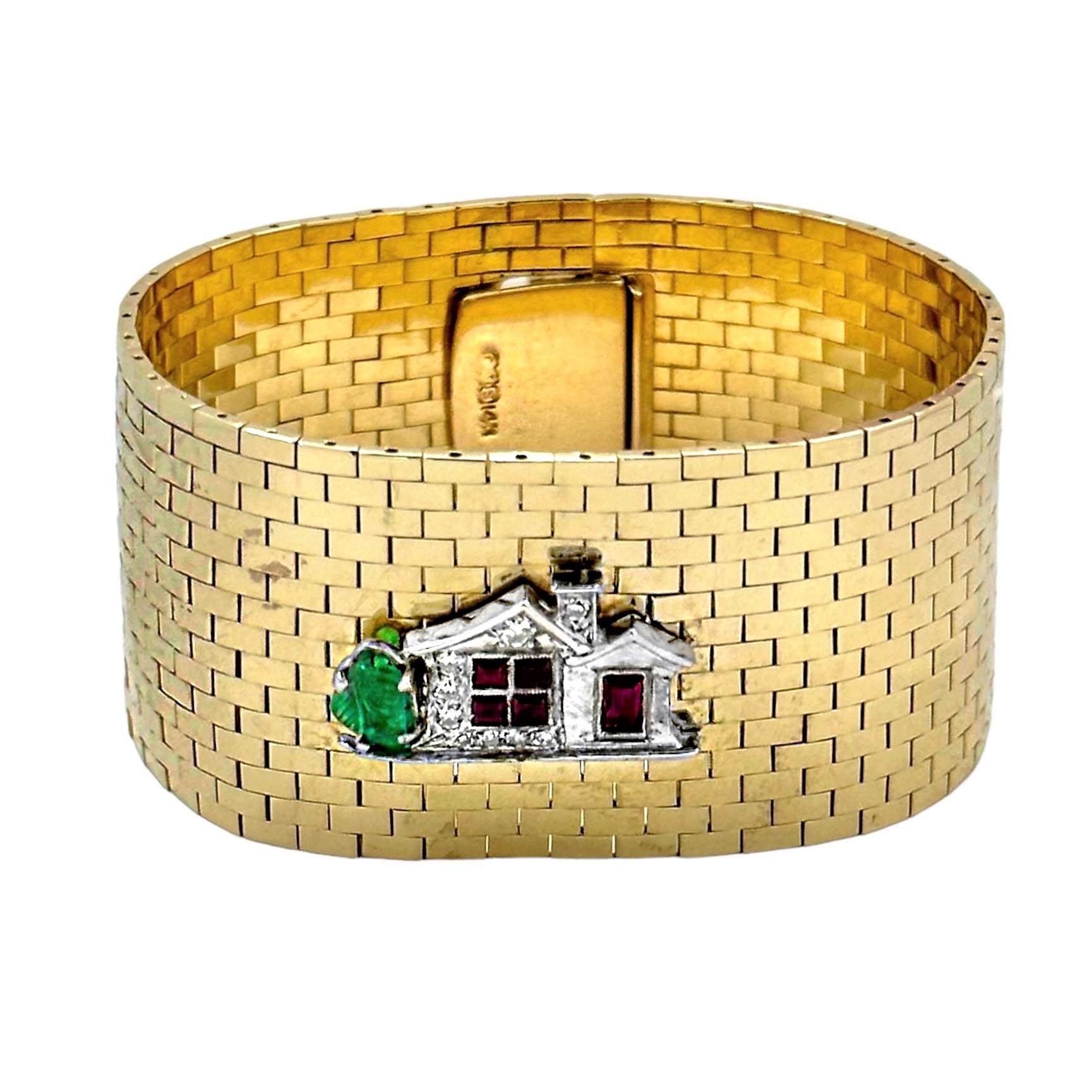 This lovely and sentimental 1940's 14K yellow gold brick bracelet is adorned with an Art-Deco period platinum charm, at it's center. The finely crafted vintage charm is set with natural rubies, emeralds and diamonds. This item is exemplary of a