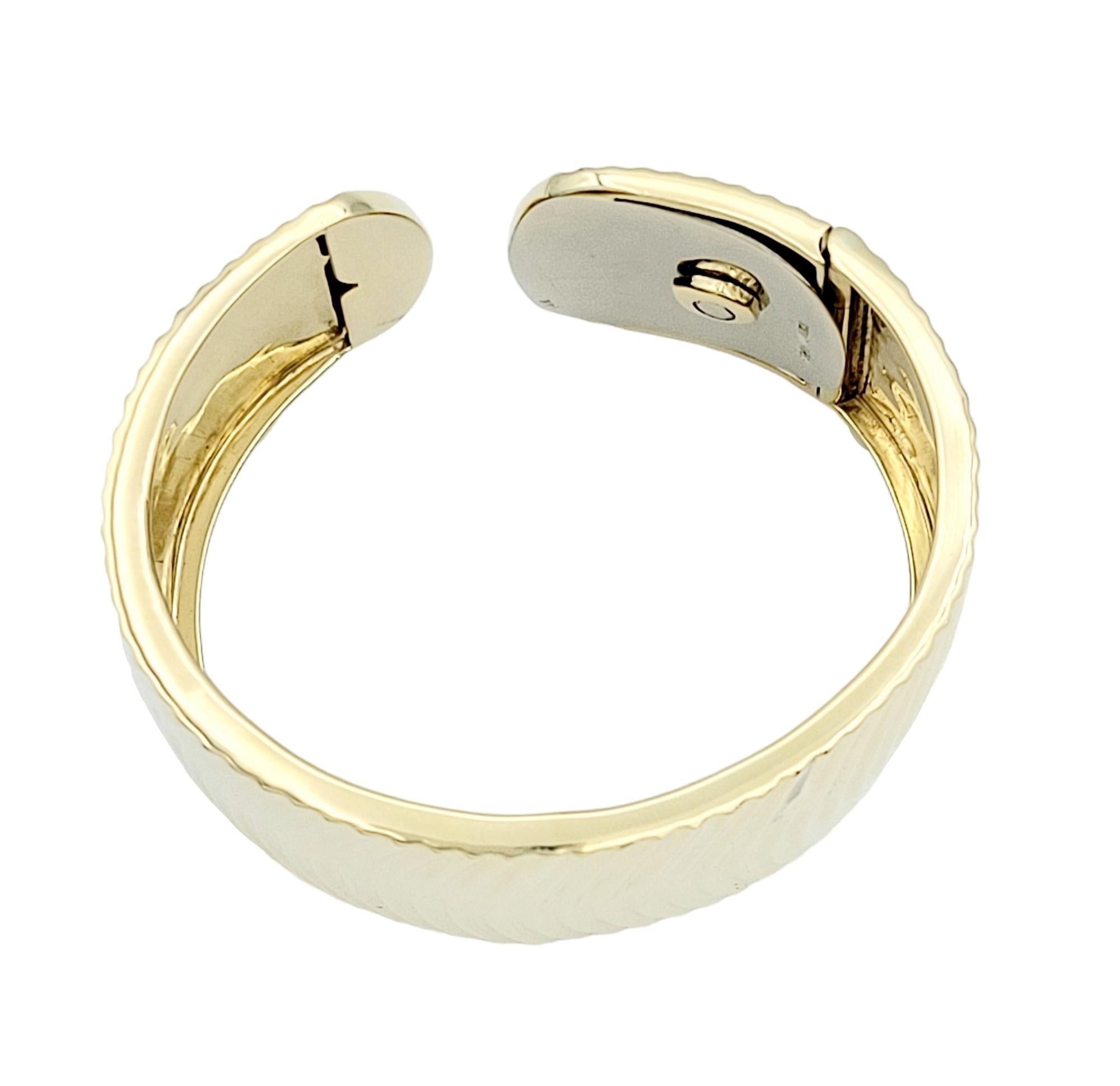Women's Wide Ridged Cuff Bracelet with Hinge Opening in Polished 14 Karat Yellow Gold  For Sale