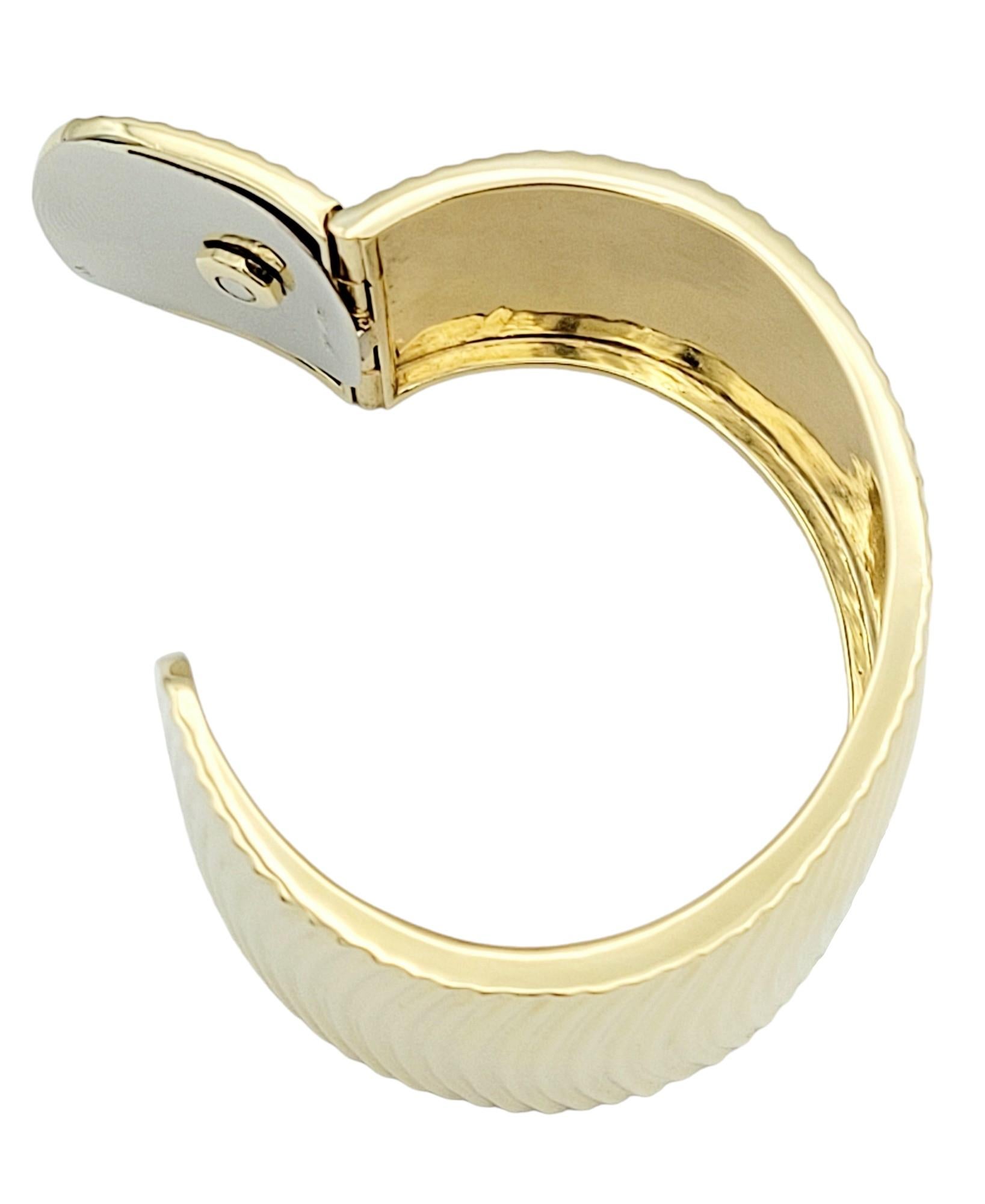 Wide Ridged Cuff Bracelet with Hinge Opening in Polished 14 Karat Yellow Gold  For Sale 1