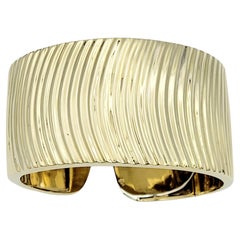 Wide Ridged Cuff Bracelet with Hinge Opening in Polished 14 Karat Yellow Gold 