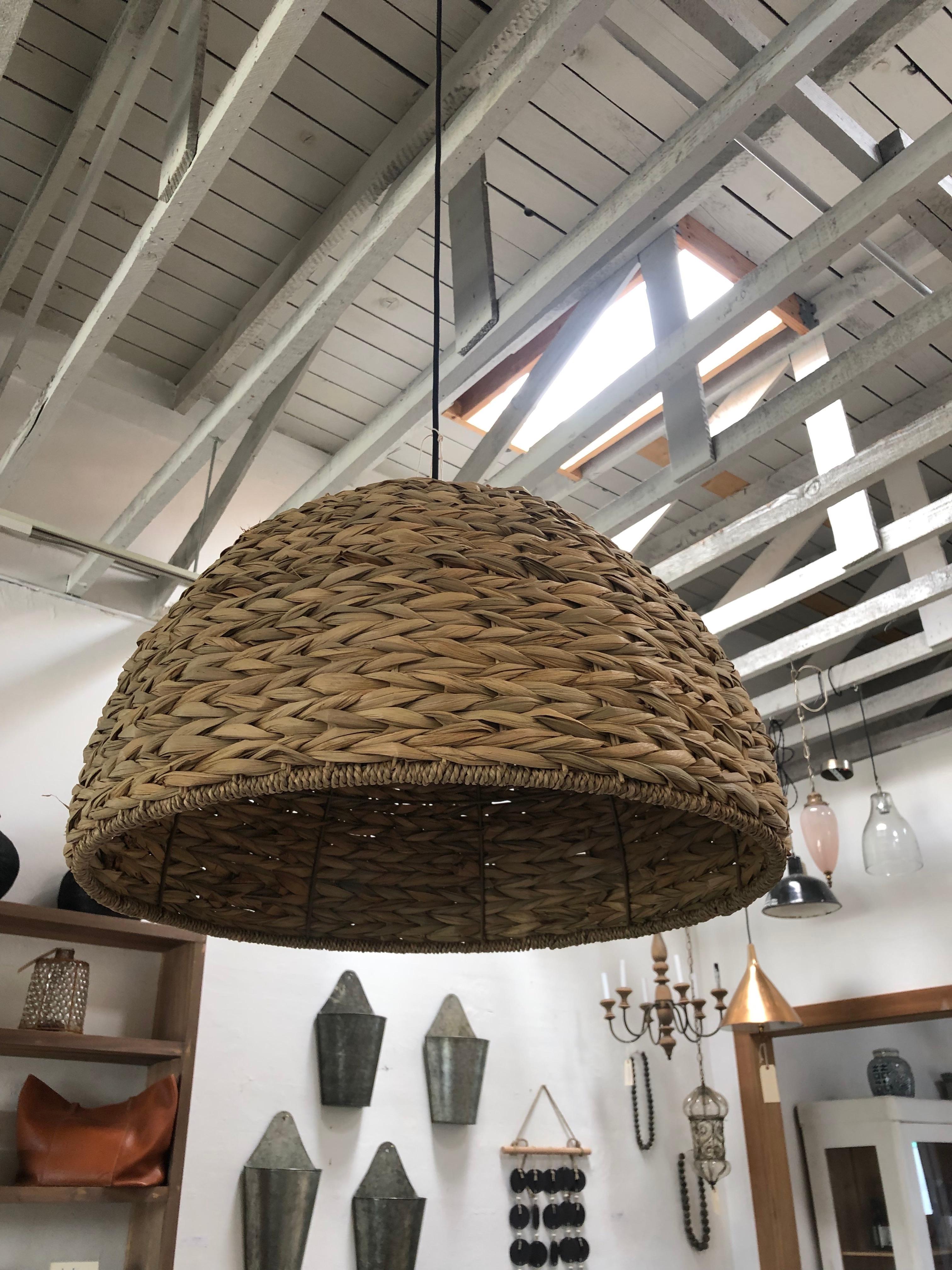 Beautiful seagrass pendant with a wide brim and tightly woven edges. Can be used to add a rustic or farmhouse style to any room.