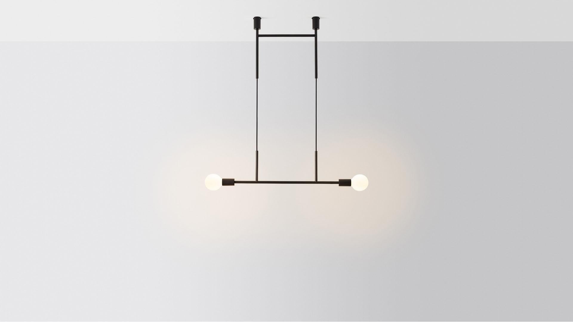 Wide step kick pendant light by Volker Haug
Dimensions: W 95.5 x H 71 cm 
Material: Brass. 
Finishes: Polished, aged, brushed, bronzed, blackened, or plated
Cord: Fabric or metal
Lamp: Opal G95 LED (E26/E27 110 - 240V, 12V version