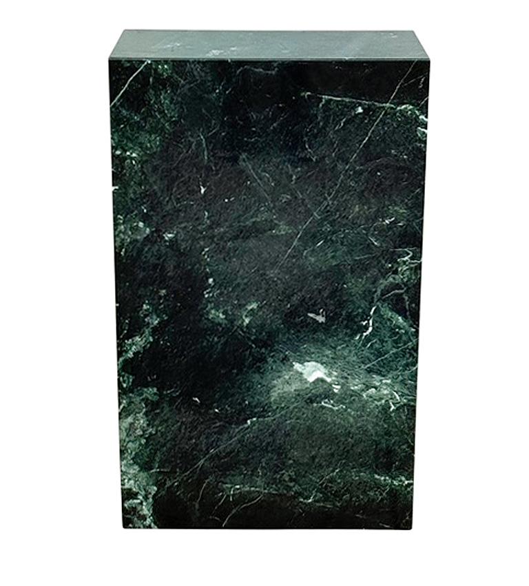 A simple yet elegant green marble pedestal table from Italy circa 1980's. It features beautiful veining of solid slab marble construction. Extremely heavy. 