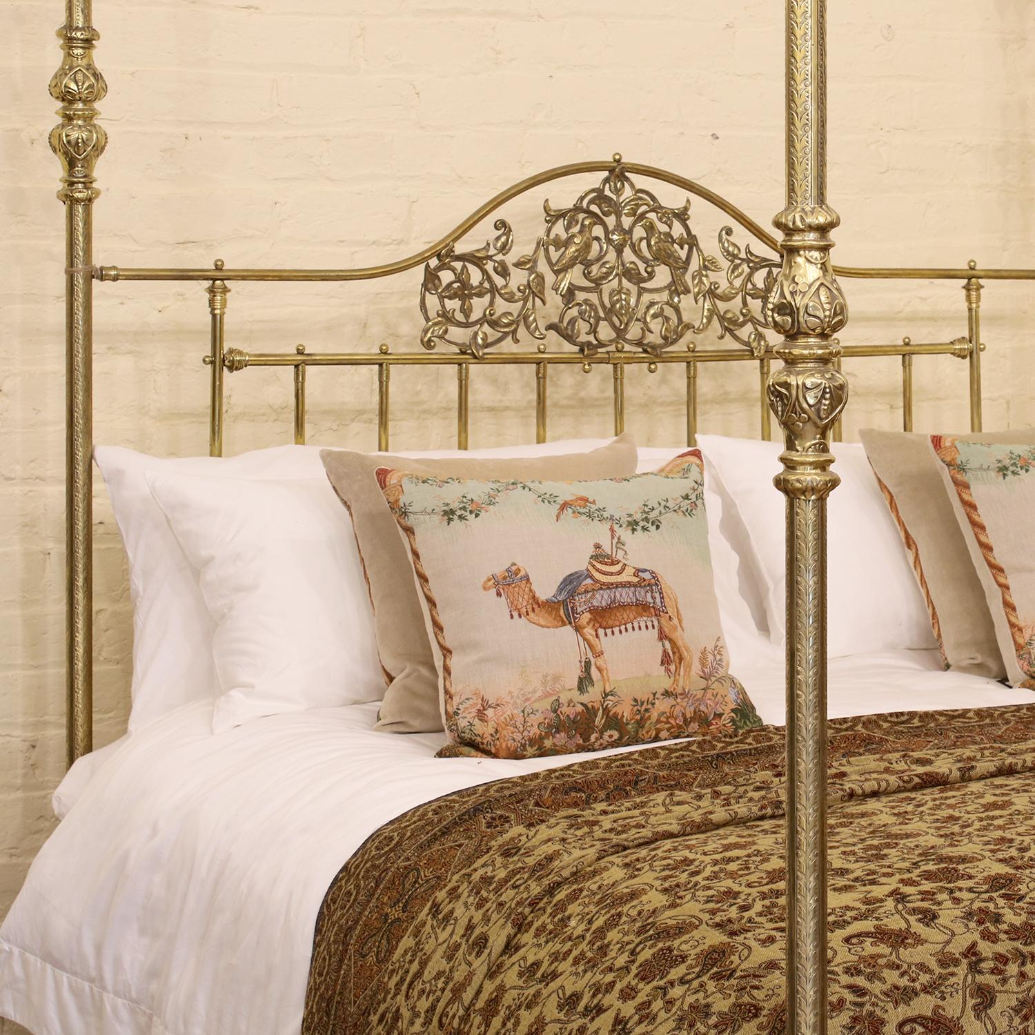 A superb all brass tall post bed with intricate pressed-brass posts, ornate brass fittings and large brass casting on the head panel depicting love birds. 

Originally manufactured in Birmingham, circa 1870, this bed was made for export and was