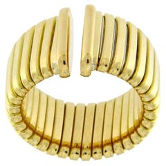 Wide tubogas yellow gold ring 