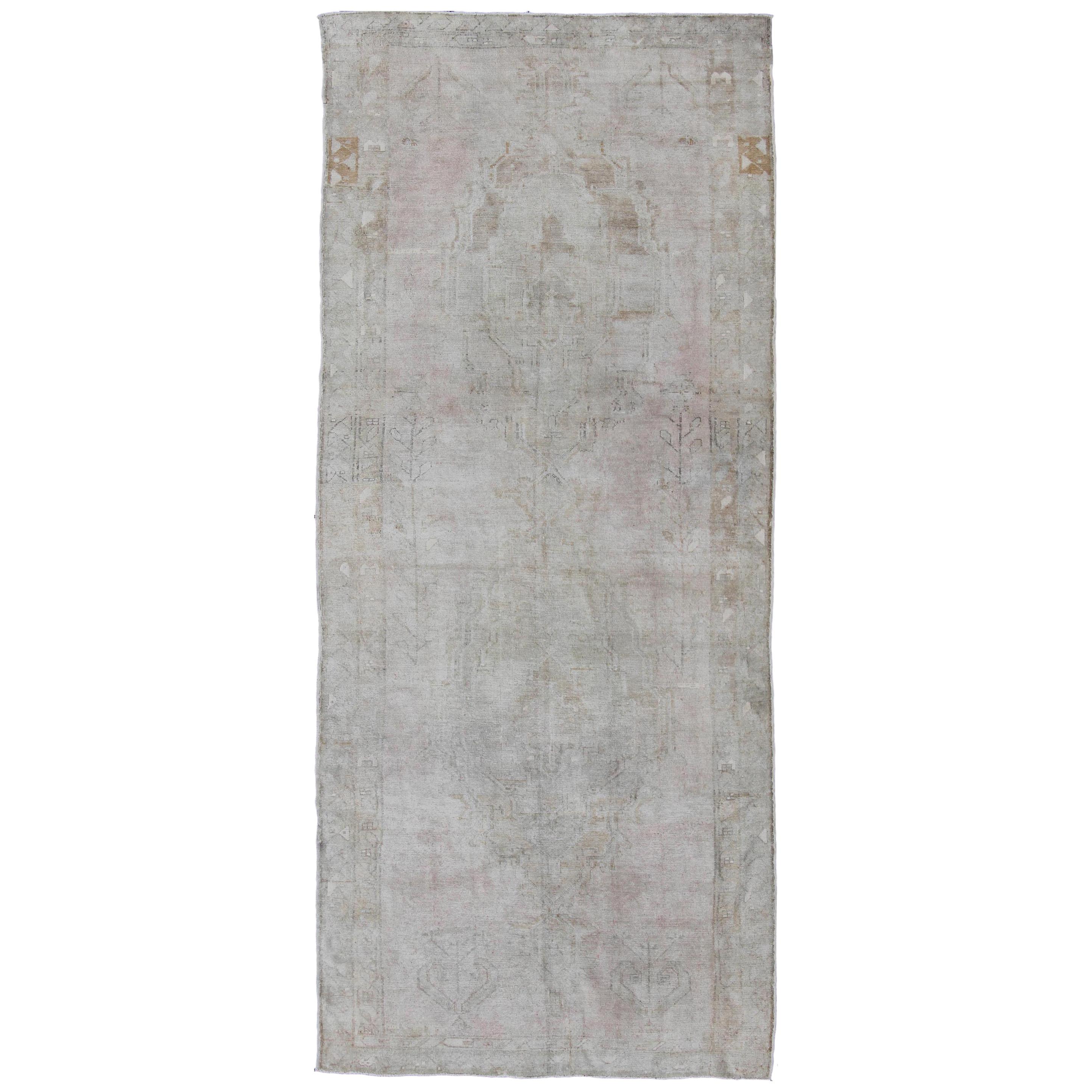 Wide Turkish Oushak Gallery Rug in Muted Tones with All-Over Design For Sale