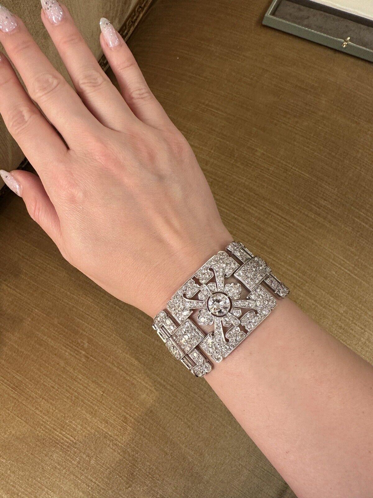 Wide Vintage Diamond Bracelet 35 carats in Platinum and White Gold. 

Wide Vintage Diamond Bracelet features three large European Cut Diamonds in the center of each square panel. The weight of the center diamond is estimated at 2.15 carats; the