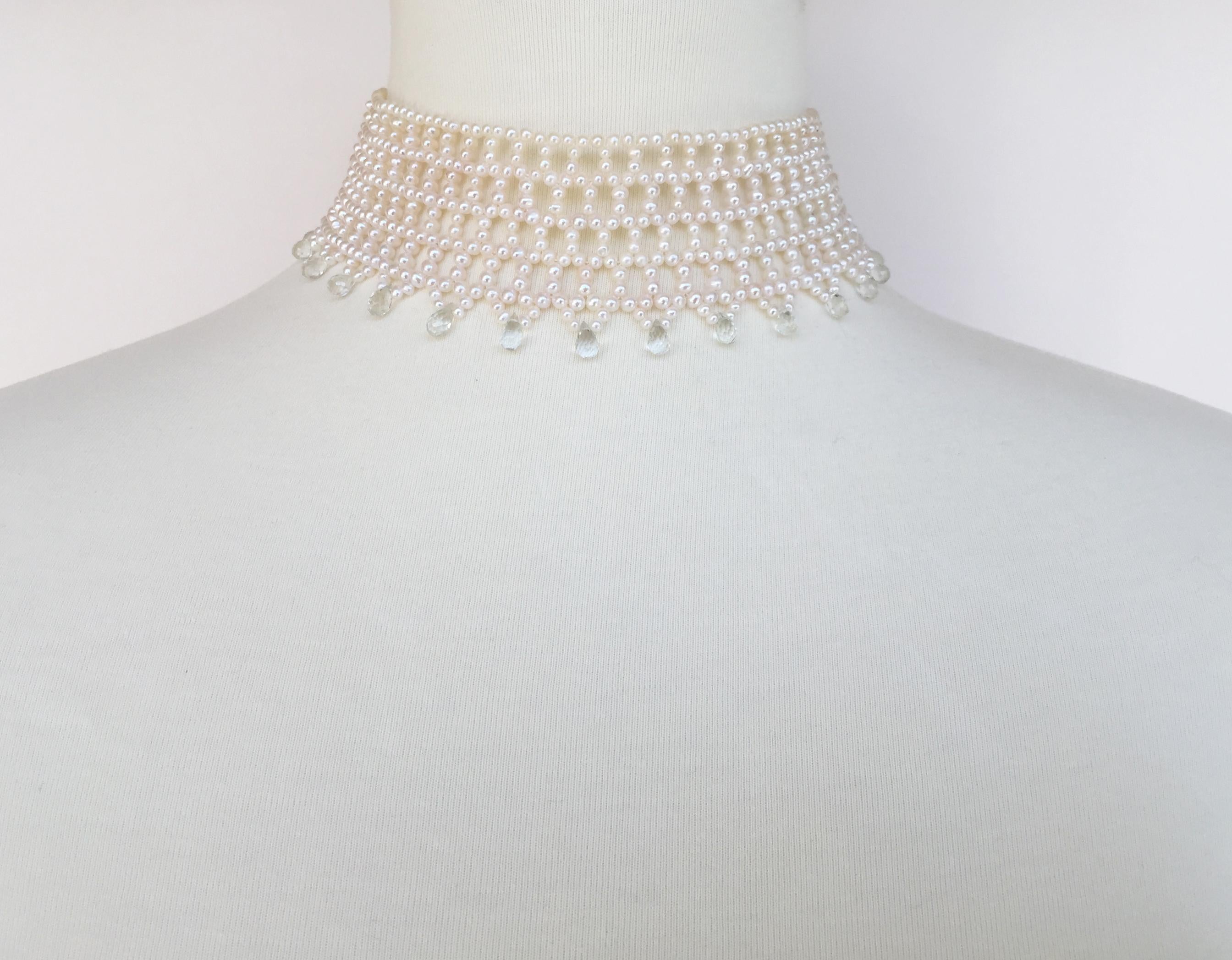 This wide woven white pearl choker with green amethyst briolettes and sliding sterling silver clasp (rhodium plated) was handcrafted by Marina J. Translucent green amethyst faceted briolettes highlight the glowing white pearls of this choker. The