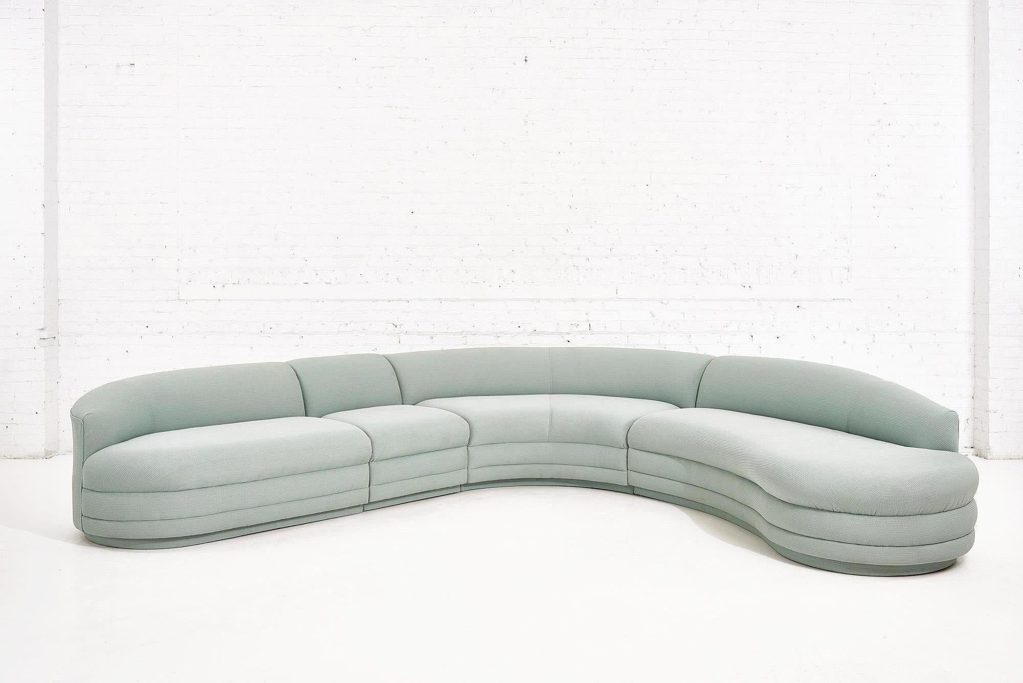 4 piece curved biomorphic sectional sofa, 1988. Designed byVladimir Kagan for Preview. Original blue/green fabric is in great condition.