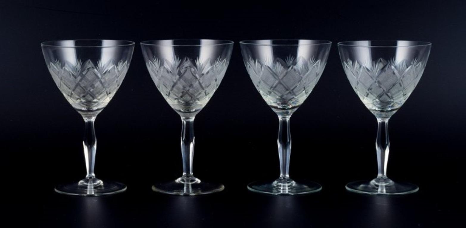 Wien Antik, Lyngby Glas, Denmark, vintage set of four clear red wine glasses.
Faceted stem.
1930s-1940s.
In perfect condition.
Dimensions: D 8.5 x H 13.0 cm.