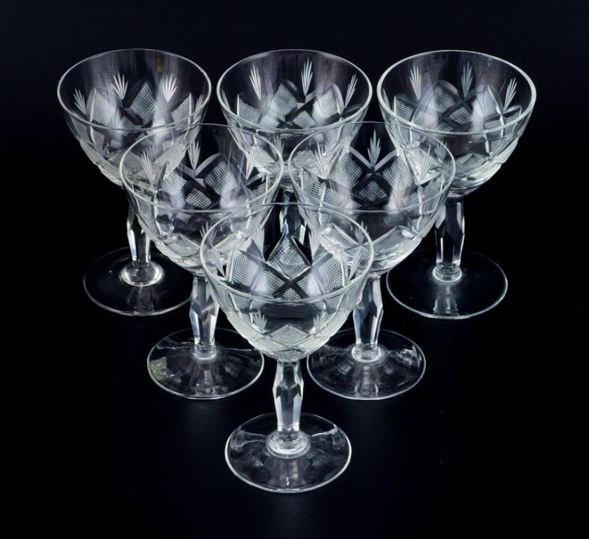 Wien Antik, Lyngby Glas, Denmark, vintage set of six clear sherry glasses.
Faceted stem.
1930s-1940s.
In perfect condition.
Dimensions: H 10.0 x D 6.5 cm.
