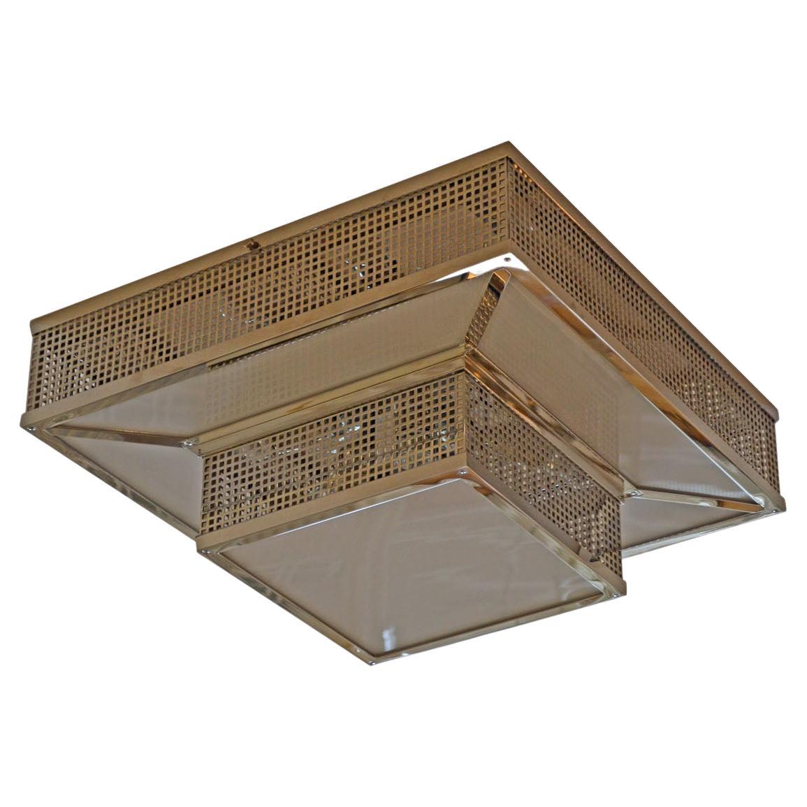 Puristic ceiling-lamp. The light shines out the punched sheet look at other image. There is as well a glass-only version available. 
All components according to the UL regulations, with an additional charge we will UL-list and label our fixtures.
 