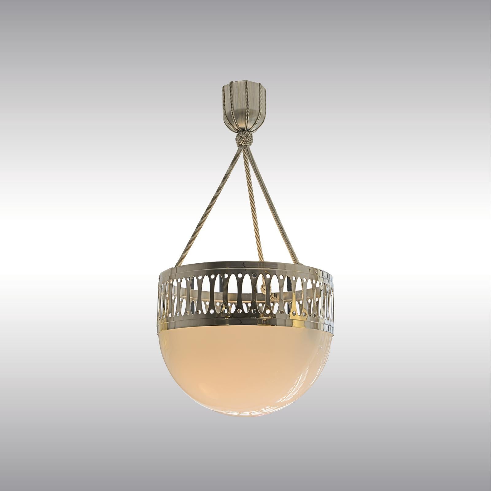 Punched brass-sheet, hand blown opaline glass 35, also available with 50 cm in diameter, hanging on passement
Length is custom made!

All components according to the UL regulations, with an additional charge we will UL-list and label our fixtures.