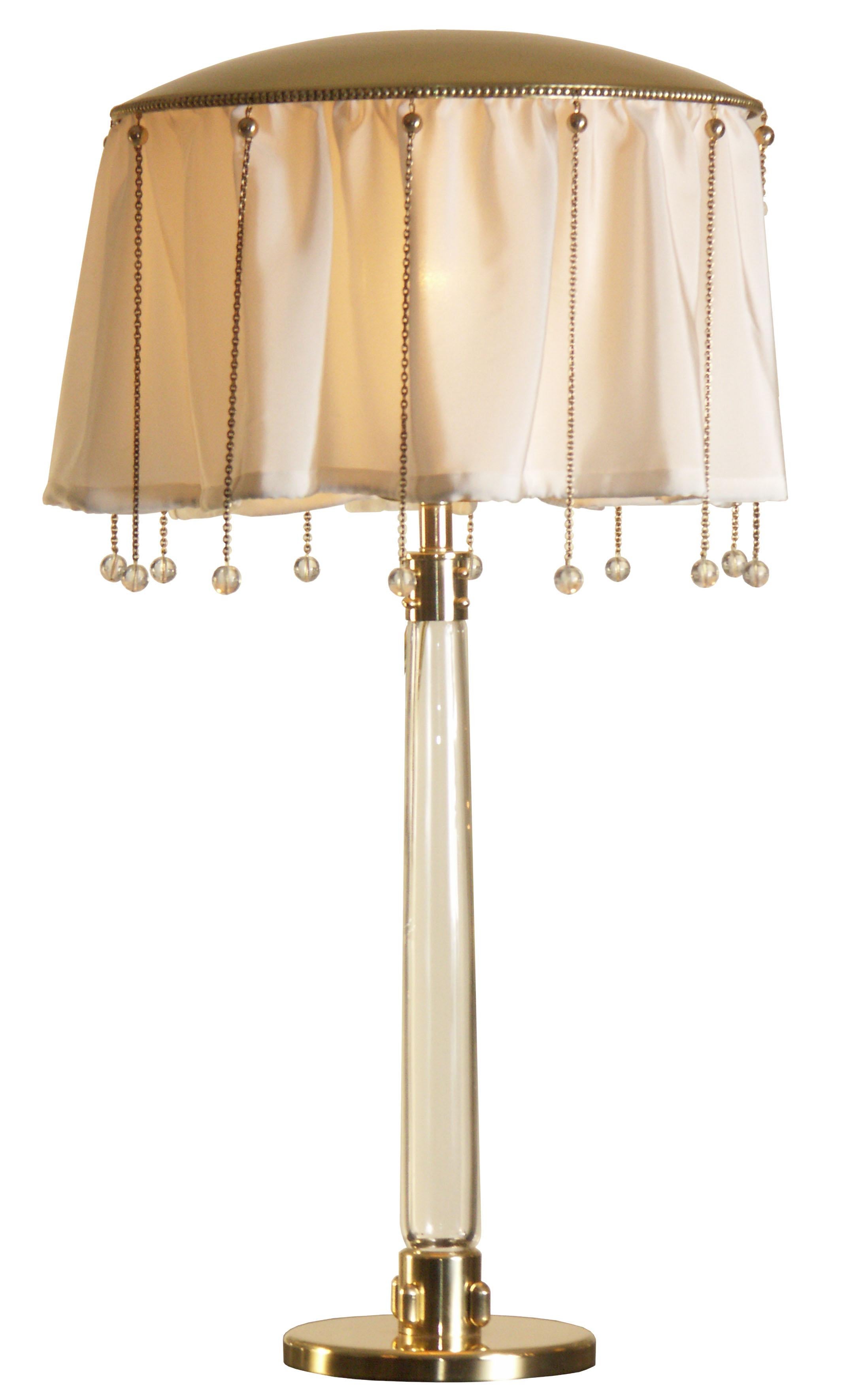 Desklamp with glass-stem

brass with the requested finish - the fabric can be delivered with a plugged - or with a leadband –border

Most components according to the UL regulations, with an additional charge we will UL-list and label our fixtures.