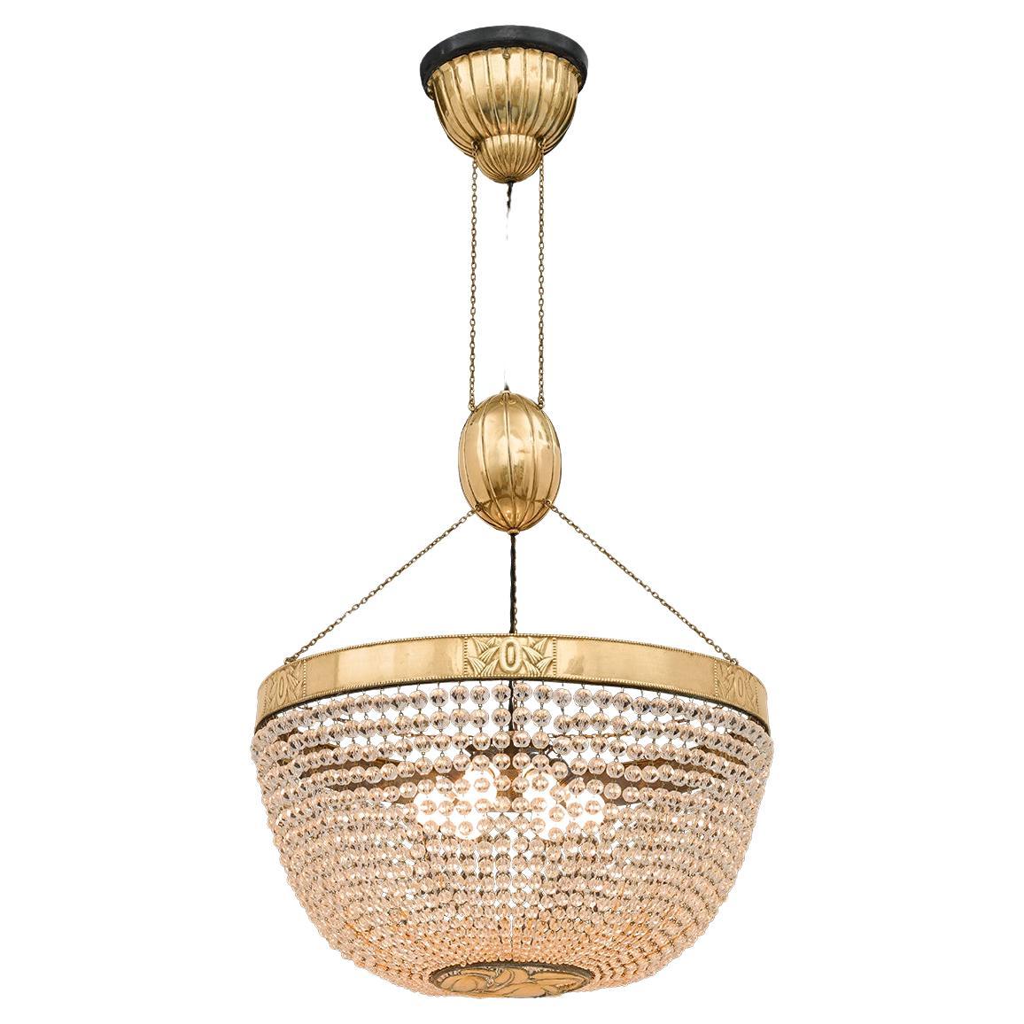 Wiener Werkstätte chased brass and glass Chandelier, Edition For Sale