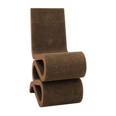 Wiggle Side Chair Designed by Frank Gehry made in Organic shaped Cardboard