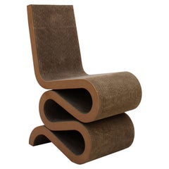 Wiggle Side Chair Designed by Frank Gehry made in Organic shaped Cardboard 