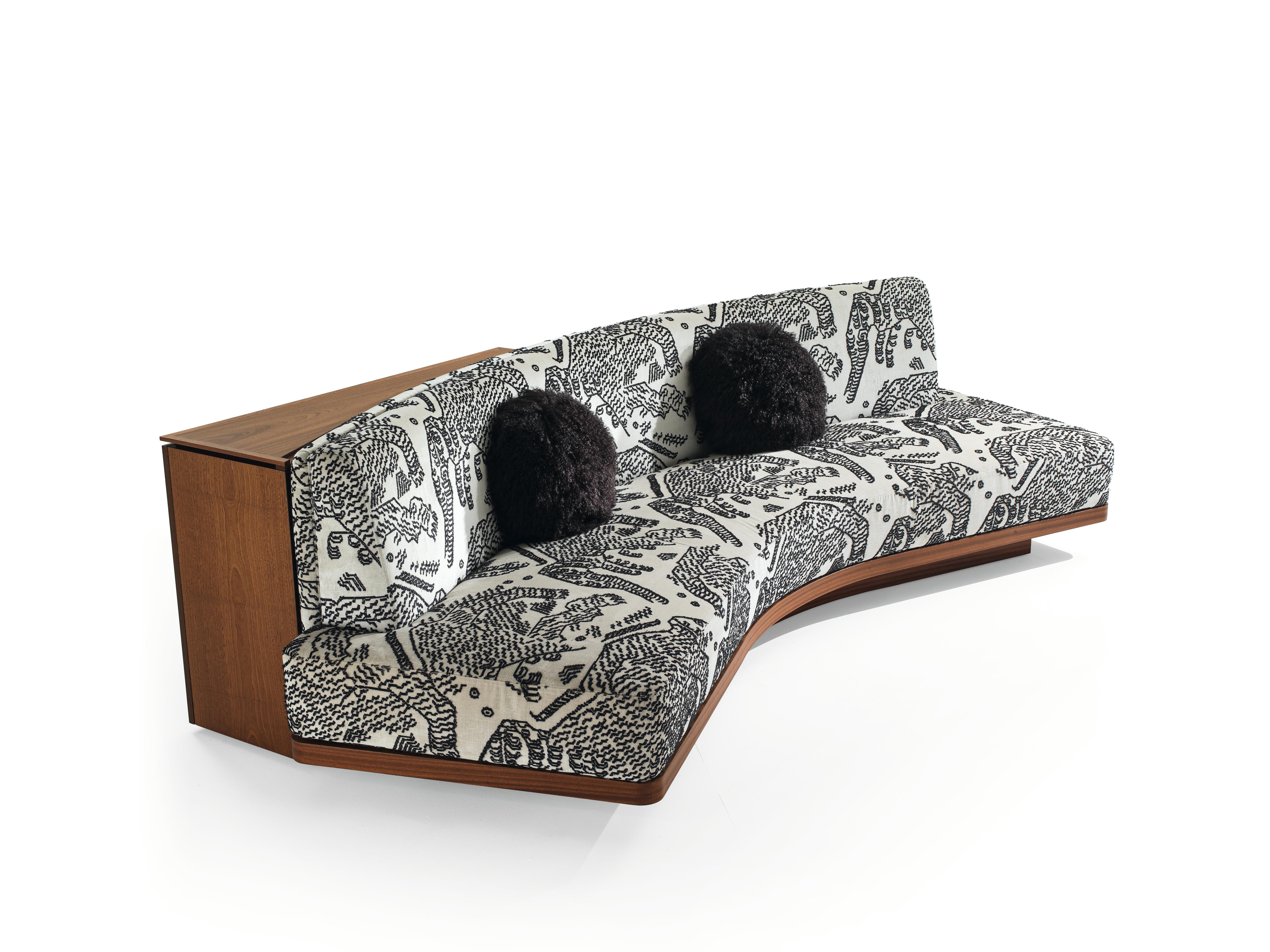 This exceptional sofa is adorned with a distinctive giraffe-striped inlay, inviting the untamed spirit of the wild into your living space. The sofa's structure features a back cabinet with two doors, offering a perfect blend of style and