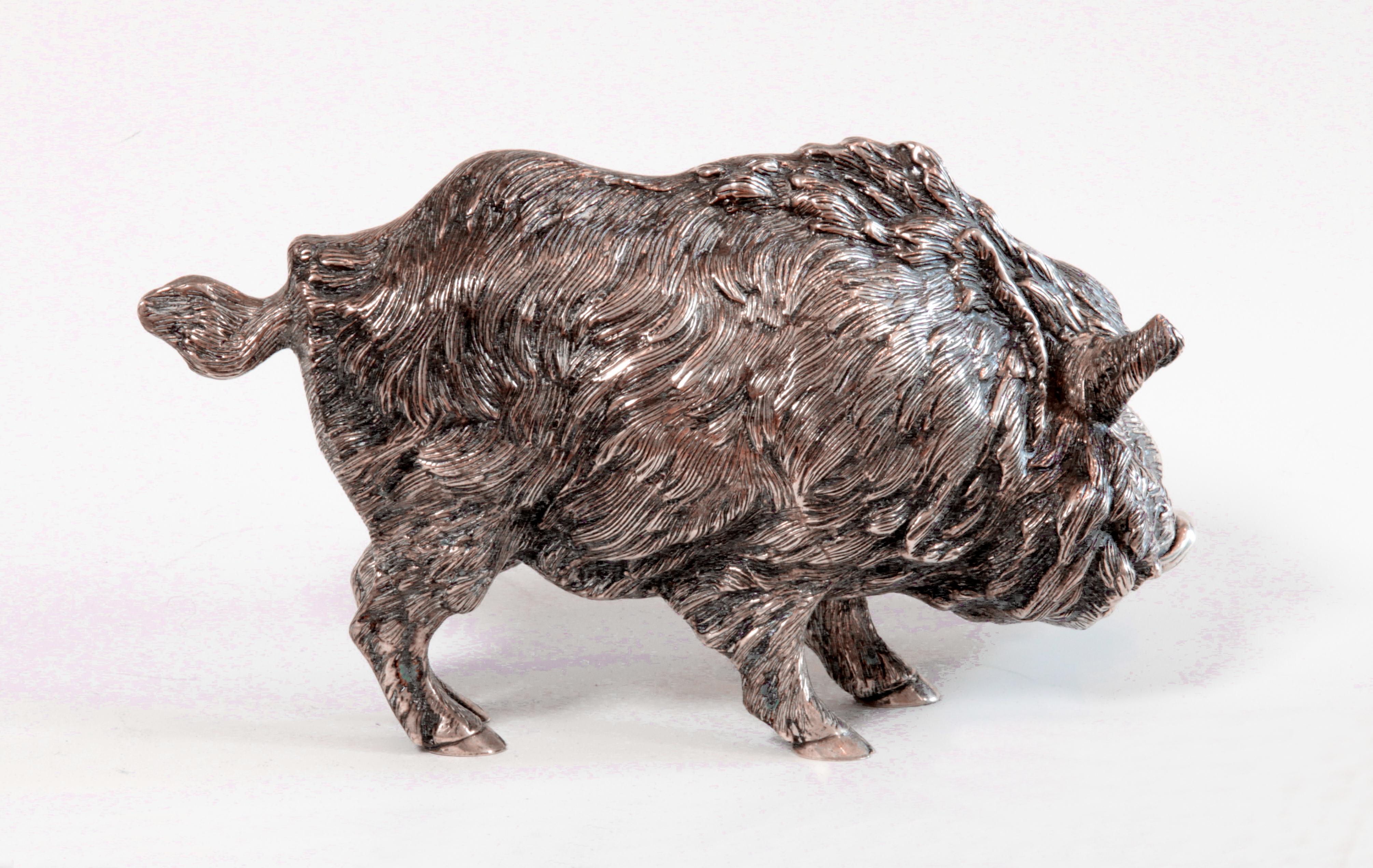 Solid silver figure of wild boar. Made in Spain, 1880. Marked on the tip at the tail.
Measurements: width 7.48 in ( 19 cm ), height 3.94 in ( 10 cm ), depth 2.36 in ( 6 cm ).

