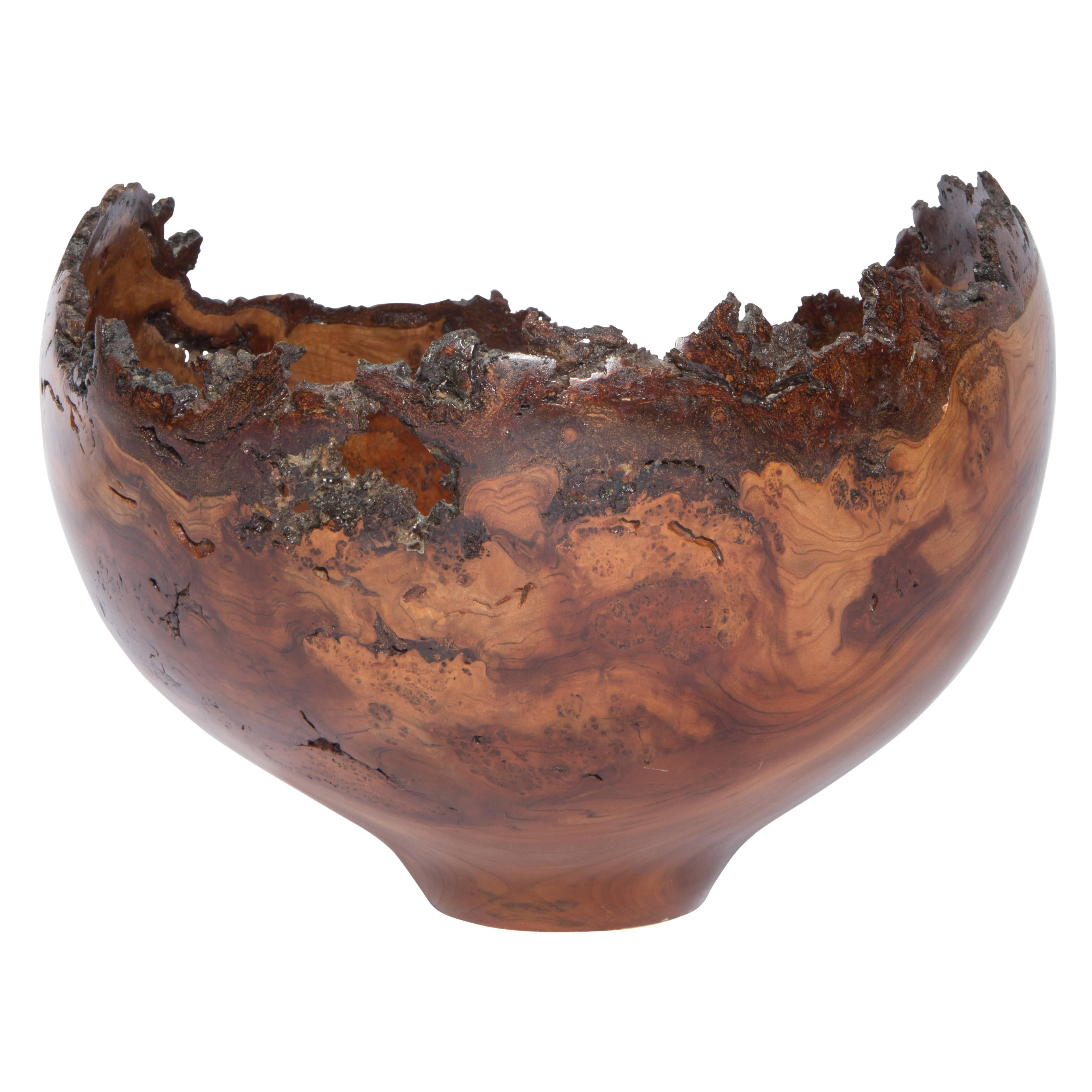 Gorgeous turned Wild Cherry bowl featuring rich swirls of grain and a very dramatic live-edge lip. Signed on the bottom 