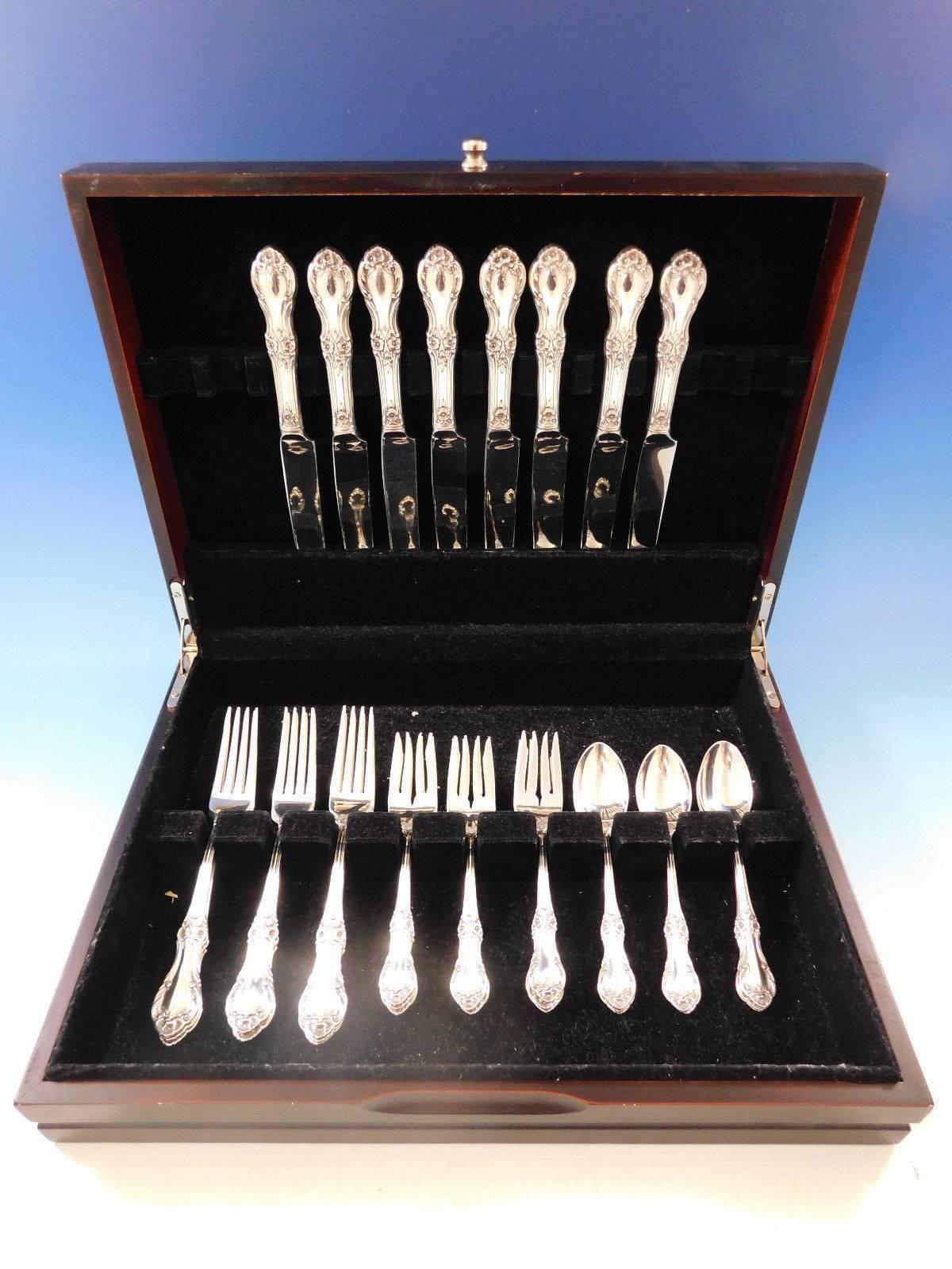 Wild Rose by International sterling silver Flatware set - 32 pieces. This set includes:

Eight knives, 9 1/8