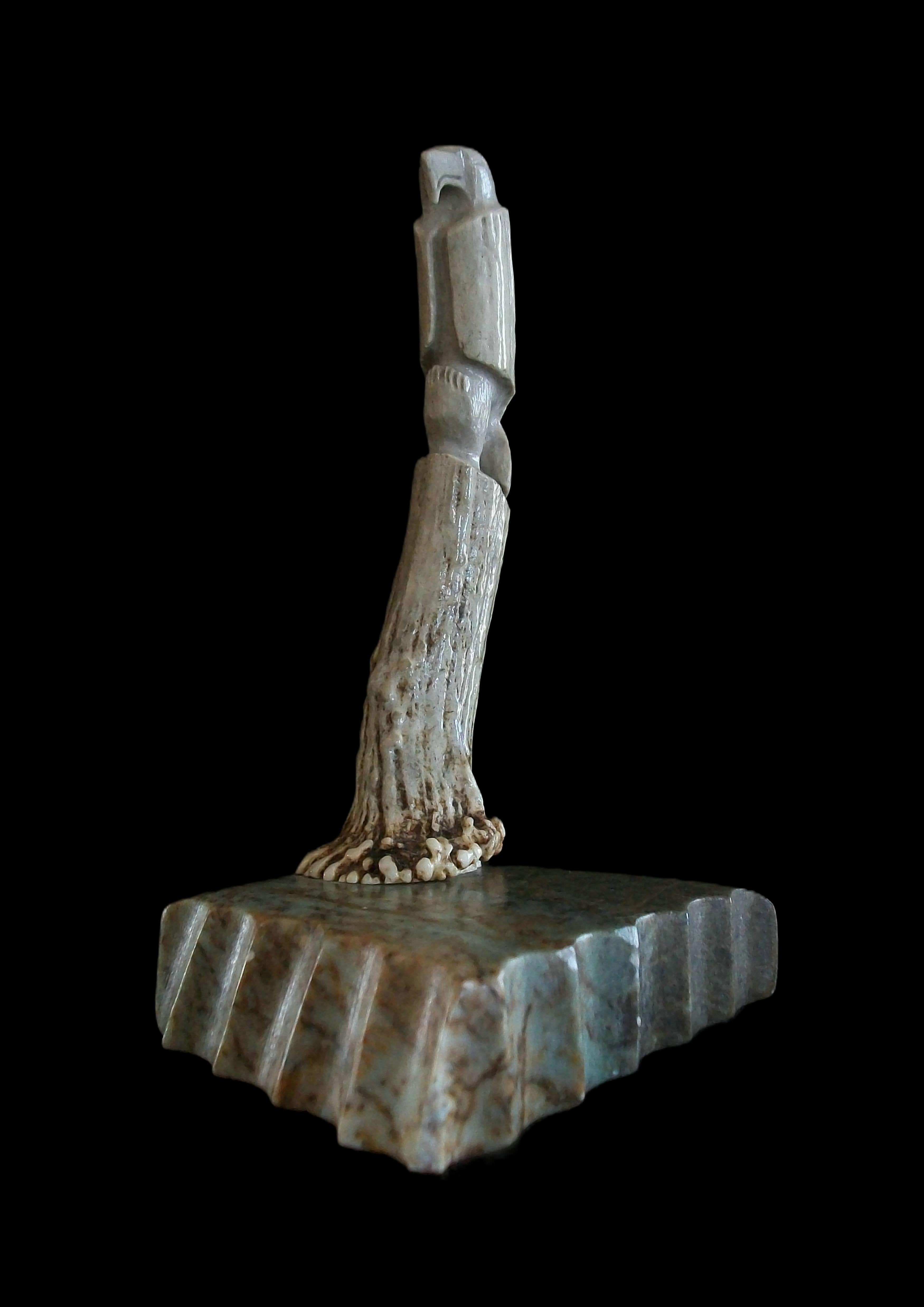 WILDE (Unknown/Unidentified Artist) - Inuit naturally shed deer antler and stone carving of an eagle - hand carved featuring a perched eagle set on a natural stone plinth with half circle cutouts and polished edges - signed at the base of the antler